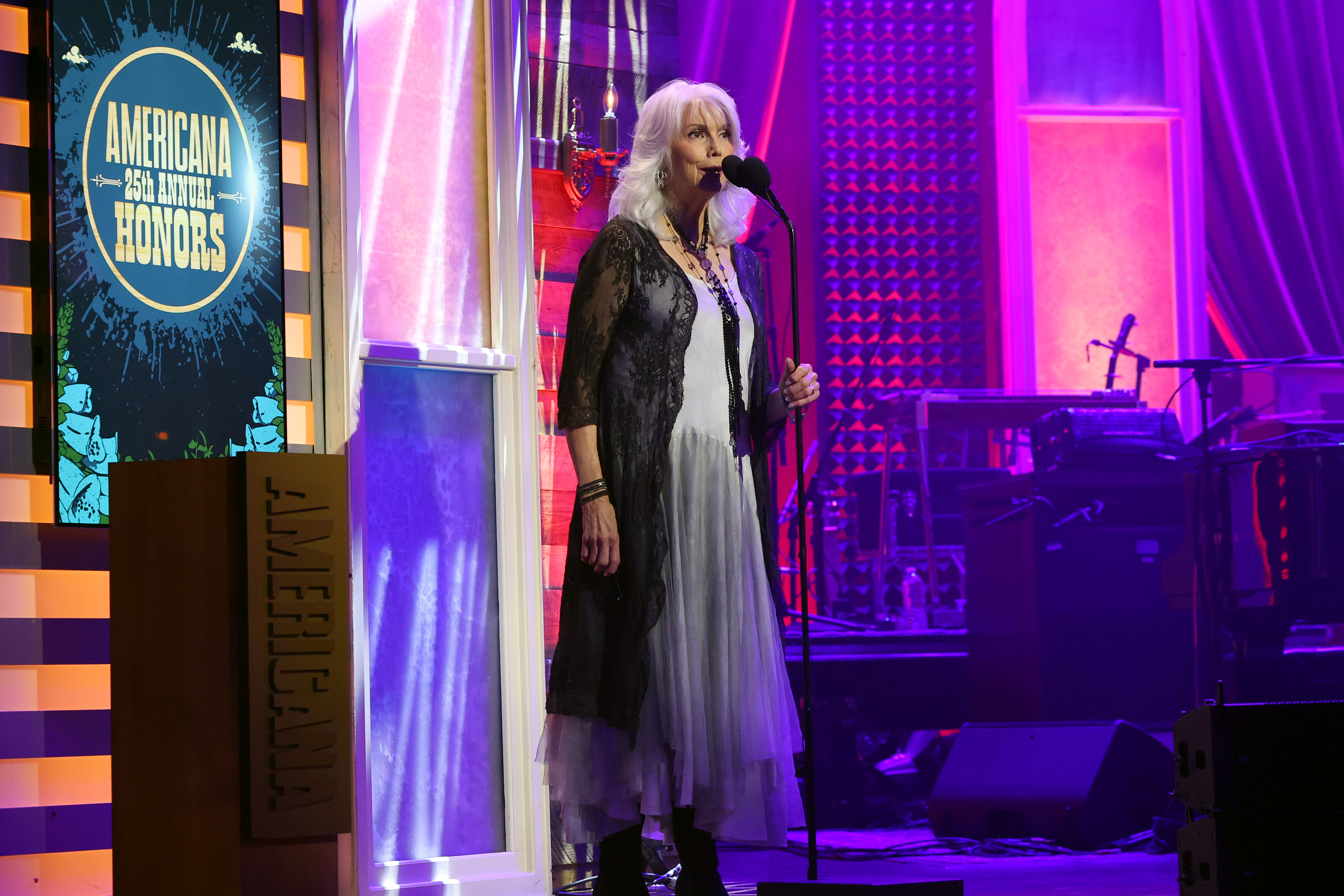 NASHVILLE, TENNESSEE - SEPTEMBER 16: Emmylou Harris speaks onstage during the 25th Annual Americana Honors & Awards at Ryman Auditorium on September 16, 2026 in Nashville, Tennessee.  (Photo by Terry Wyatt/Getty Images for Americana Music Association)