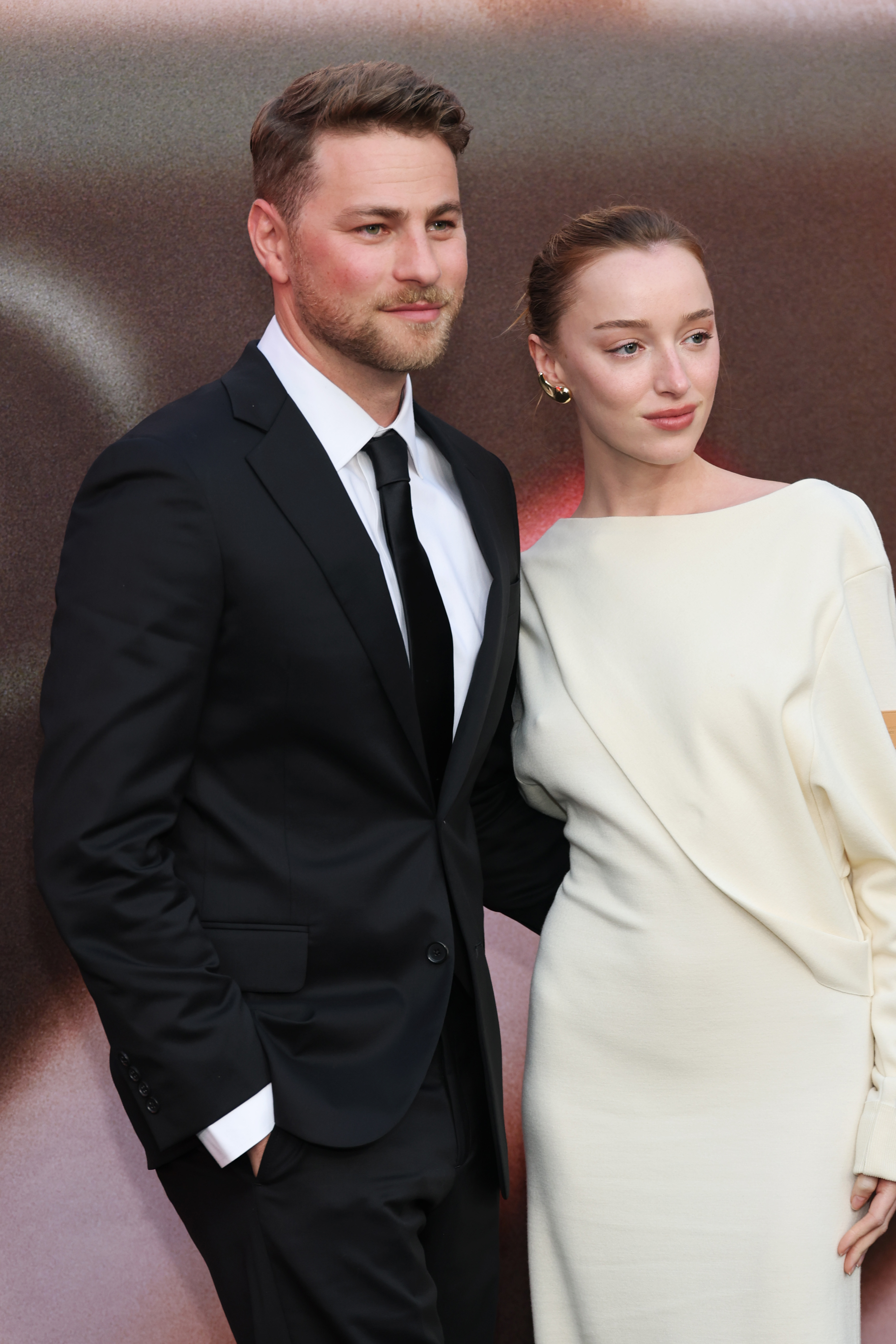 HOLLYWOOD, CALIFORNIA - APRIL 08: (L-R) Cameron Fuller and Phoebe Dynevor attend the premiere of Universal Pictures'
