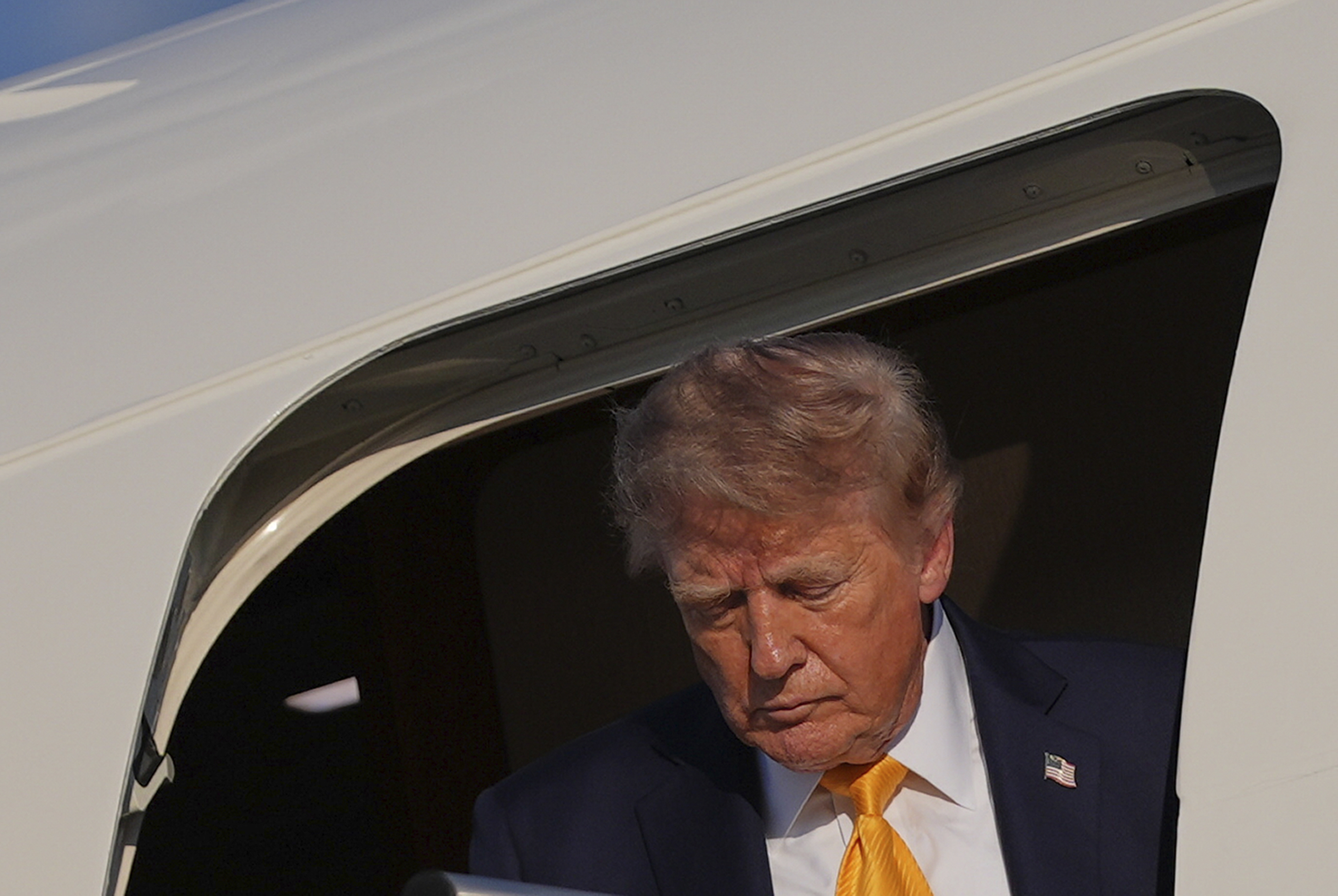 President Donald Trump arrives on Air Force One at Morristown Airport, Friday, Sept. 4, 2026, in Morristown, N.J. (AP Photo/Julia Demaree Nikhinson)
