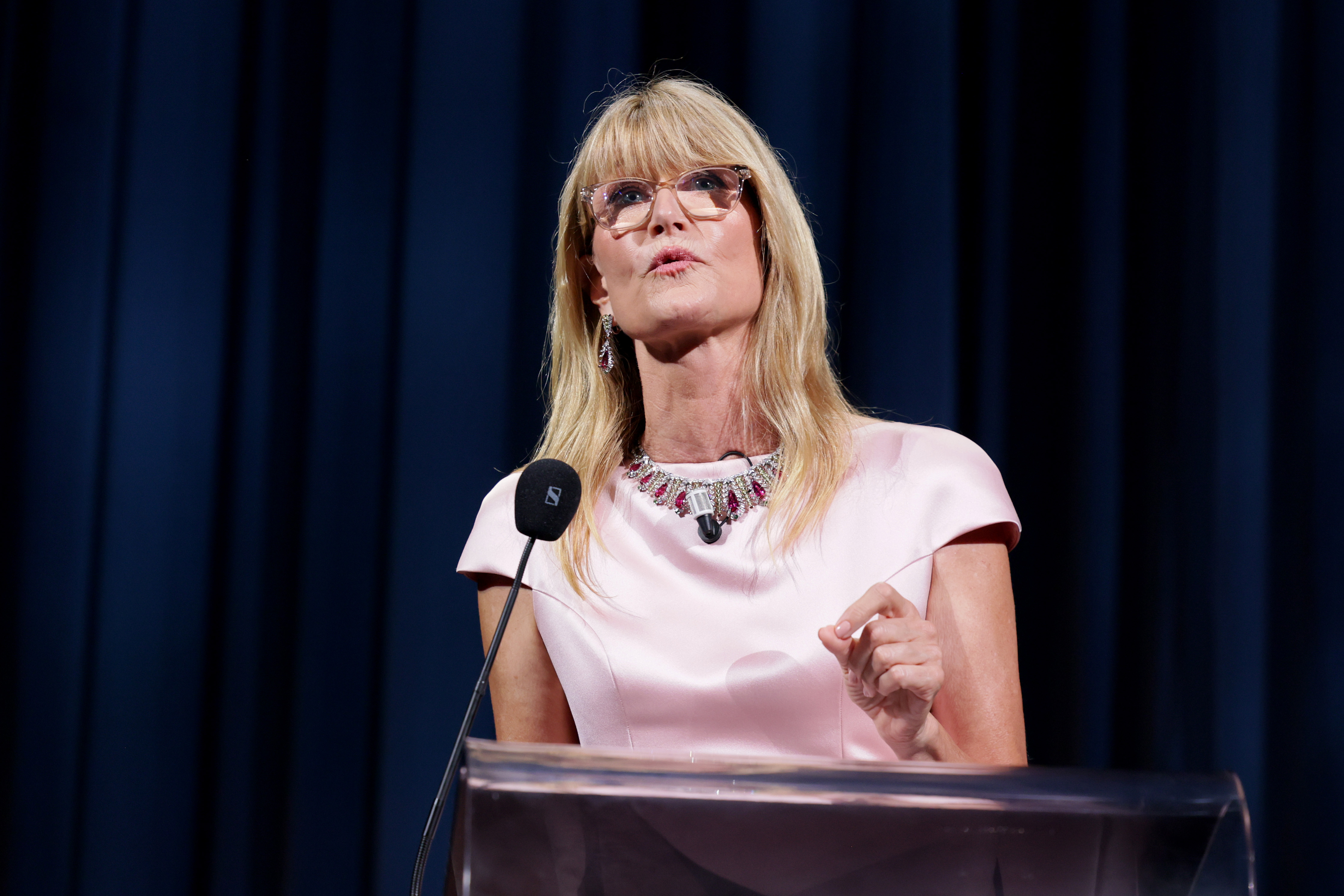 VENICE, ITALY - SEPTEMBER 02: Laura Dern speaks on stage at the Opening Ceremony & Golden Lion For Lifetime Achievement Award To George Clooney during the 83rd Venice International Film Festival at Sala Grande on September 02, 2026 in Venice, Italy. (Photo by Vittorio Zunino Celotto/Getty Images)