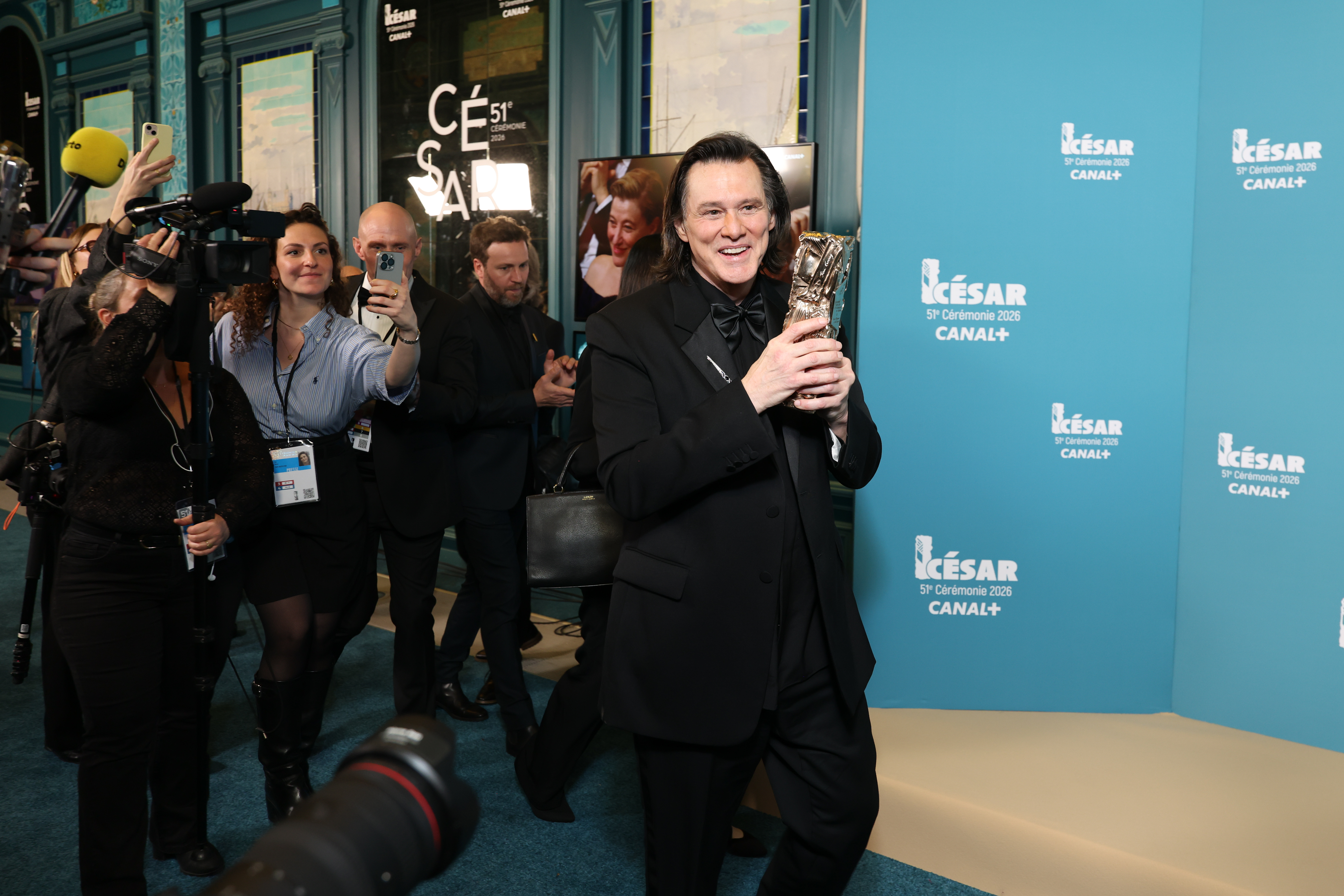 PARIS, FRANCE - FEBRUARY 26: Jim Carrey poses with the Honorary Cesar Award during the 51st Cesar Film Awards at L'Olympia on February 26, 2026 in Paris, France. (Photo by Stephane Cardinale - Corbis/Corbis via Getty Images)