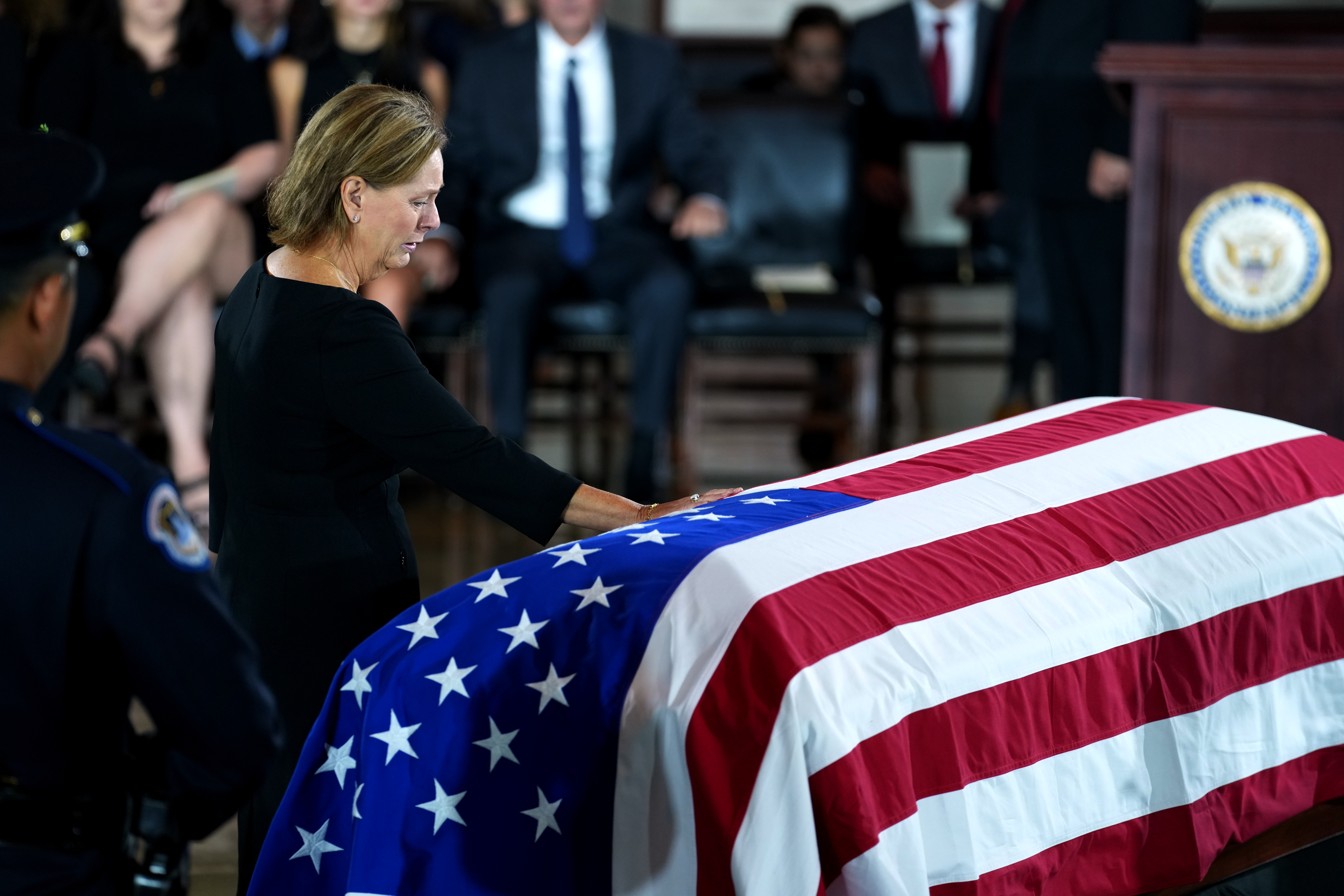 Sen. Darline Graham, R-S.C., the sister of the late Sen. Lindsey Graham, R-S.C., mourns by his casket during a Congressional tribute in the Rotunda of the U.S. Capitol, Tuesday, July 28, 2026, in Washington. (AP Photo/Allison Robbert)