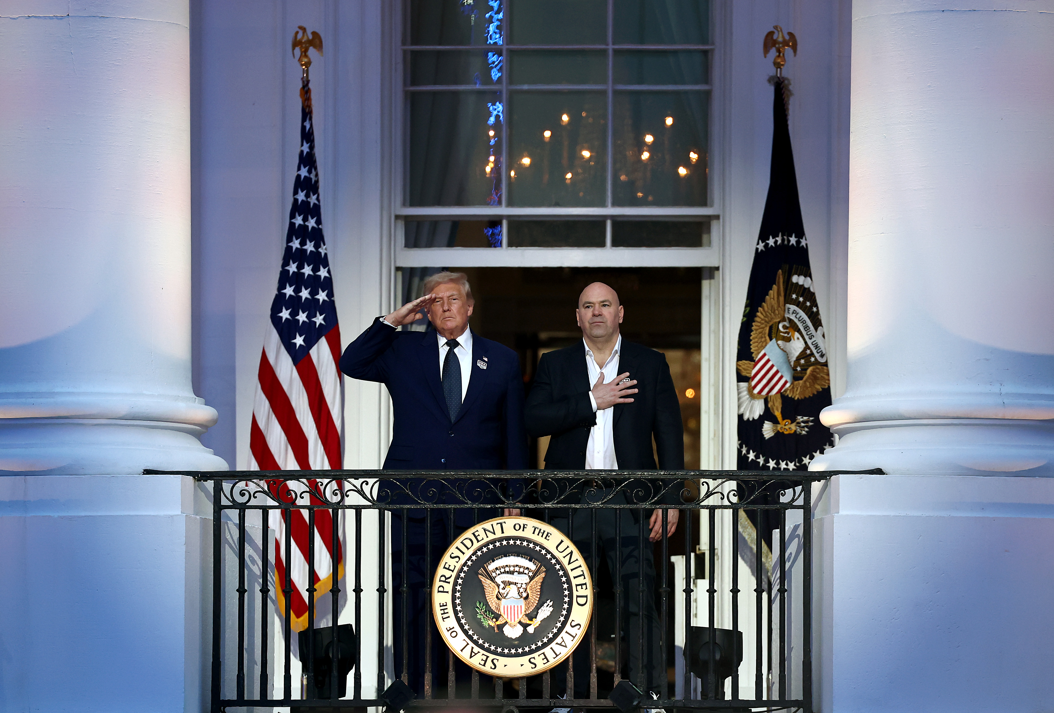 WASHINGTON, DC - JUNE 14: US President Donald Trump and UFC President and CEO Dana White look on during the national anthem during UFC Freedom 250 at the White House on June 14, 2026 in Washington, DC. (Photo by Chris Graythen/Getty Images)
