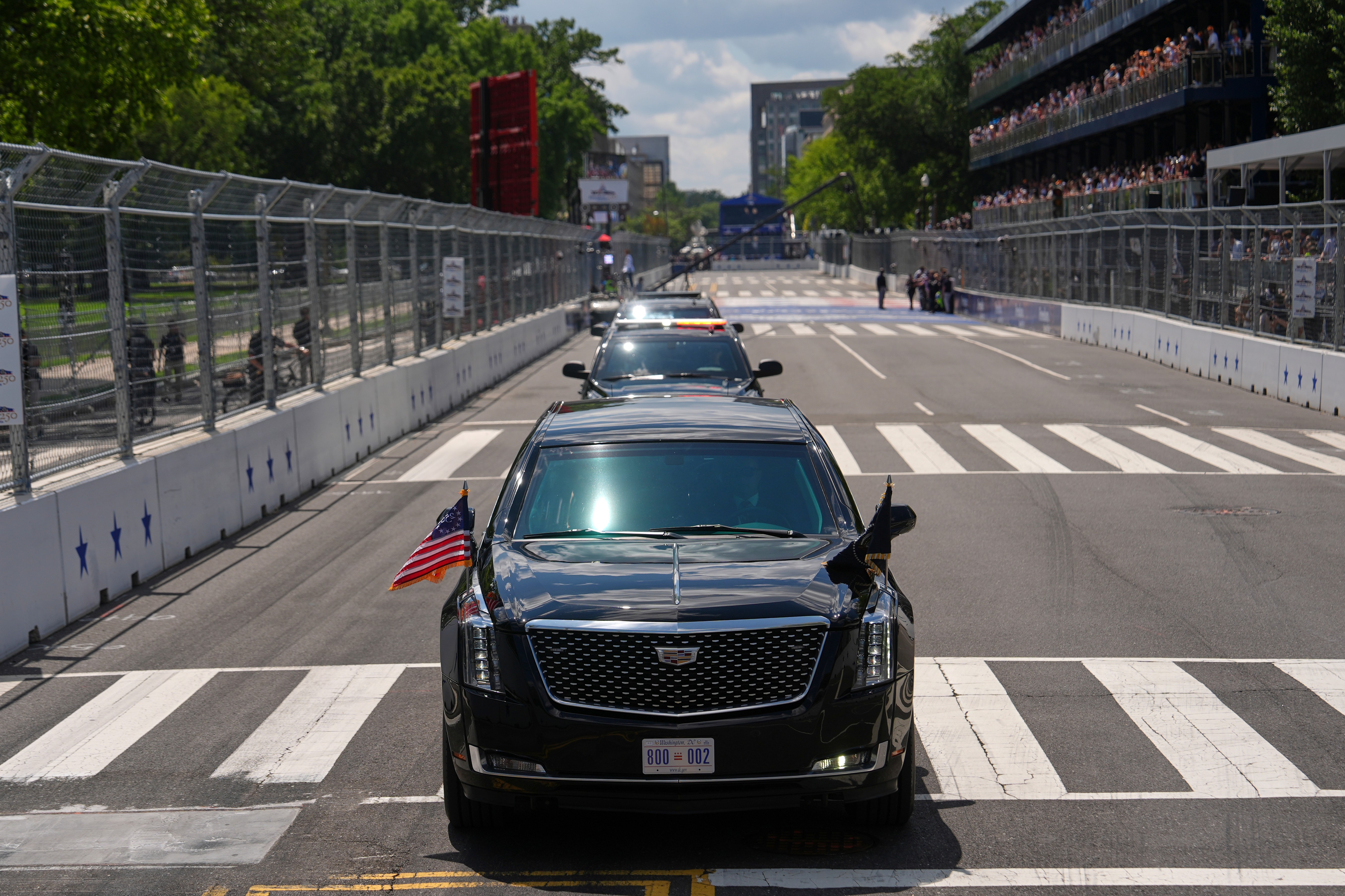 President Donald Trump, in the presidential limousine known as