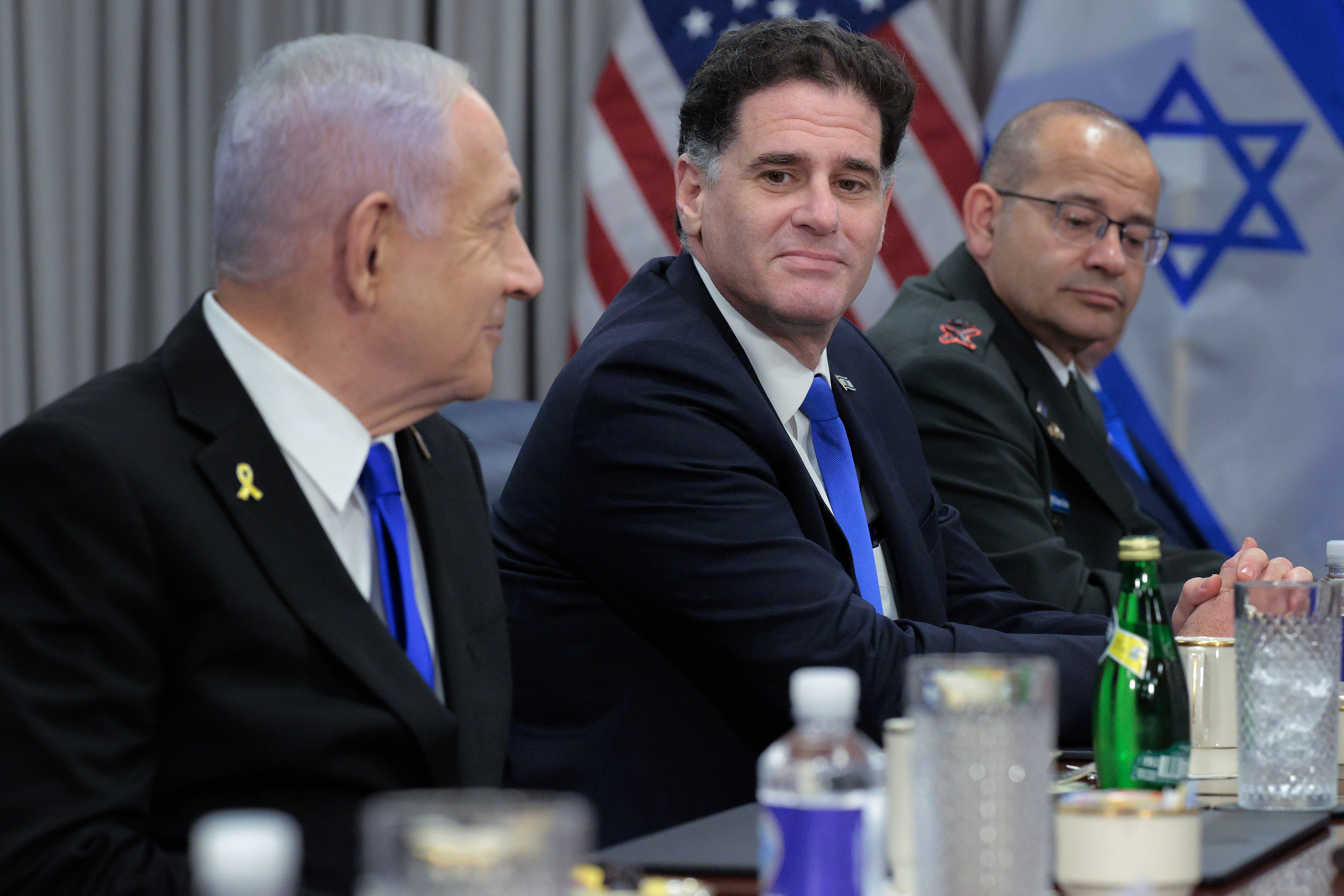 ARLINGTON, VIRGINIA - JULY 09:  Israeli Prime Minister Benjamin Netanyahu (L) is joined by Israeli Minister of Strategic Affairs Ron Dermer and other officials for a meeting with U.S. Secretary of Defense Pete Hegseth at the Pentagon on July 09, 2025 in Arlington, Virginia. Netanyahu is in Washington for meetings with President Donald Trump, members of his cabinet, Congressional leaders and other officials to discuss a potential ceasefire between Israel and Hamas. (Photo by Chip Somodevilla/Getty Images)