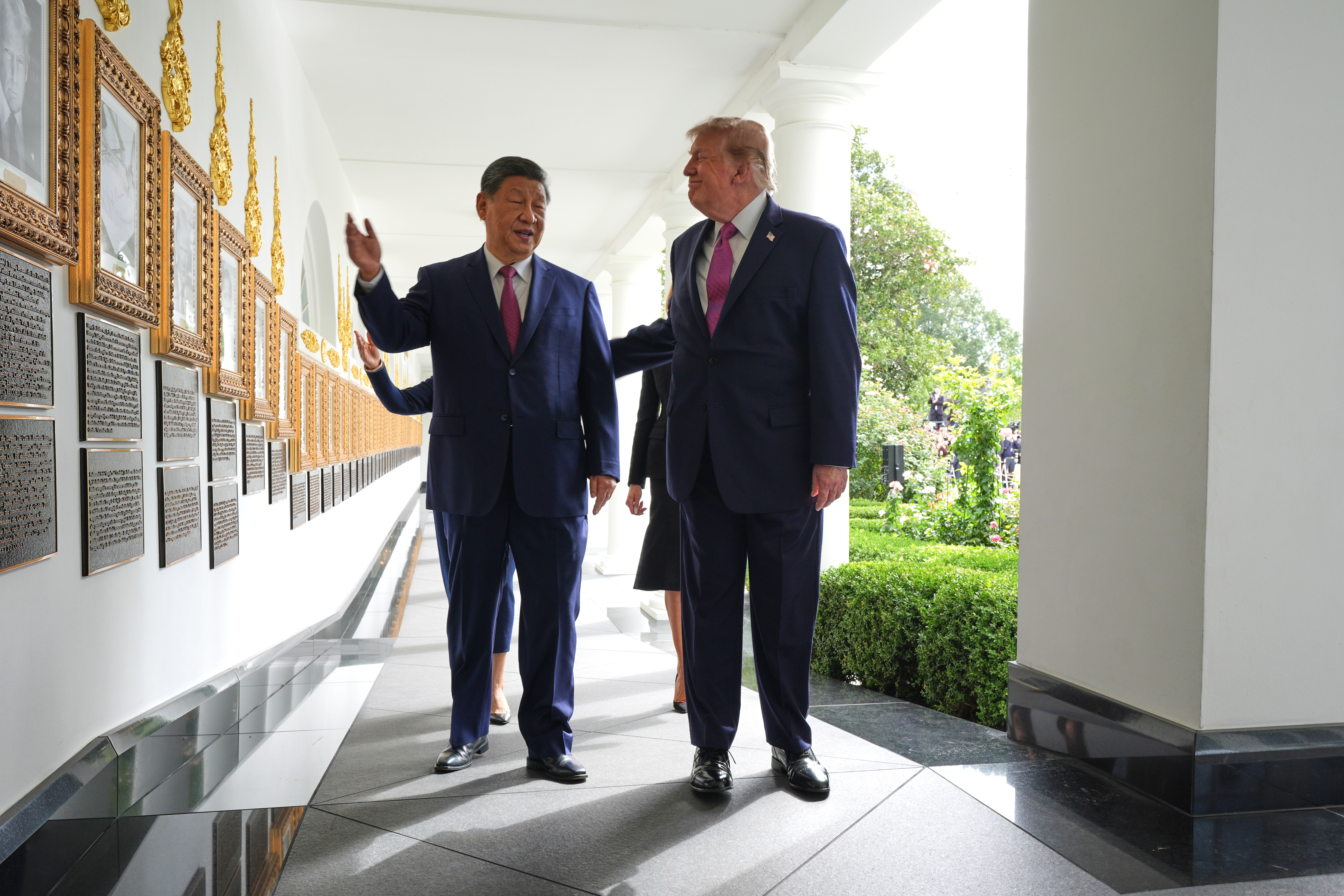 President Donald Trump and China's President Xi Jinping, along with first lady Melania Trump and Peng Liyuan walk along the Colonnade of the White House, Thursday, Sept 24, 2026, in Washington (AP Photo/Jacquelyn Martin)