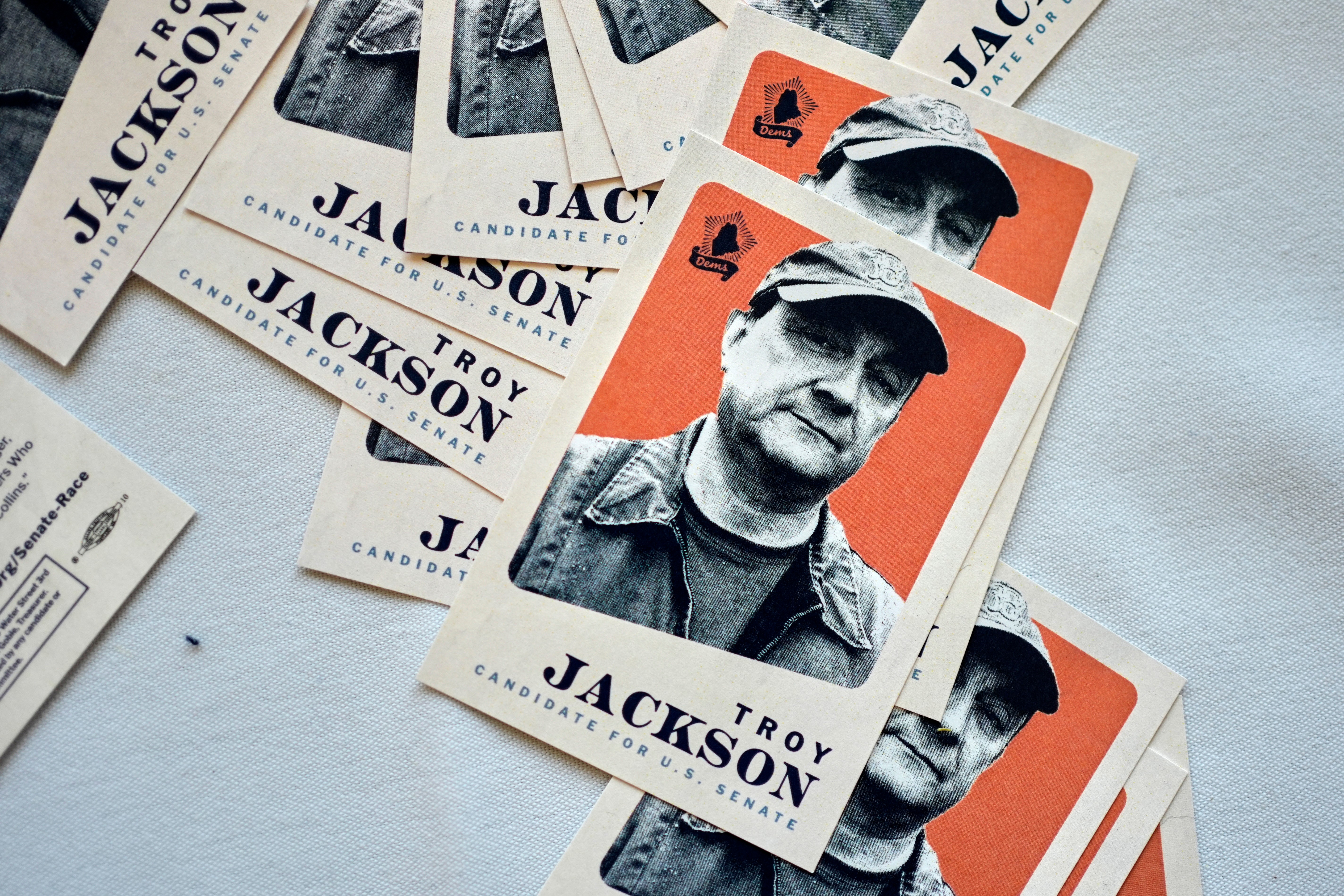 Camapign cards for Troy Jackson, Democratic candidate for U.S. Senate, are displayed in the lobby of the Maine Democratic Nominating Convention, Saturday, July 25, 2026, in Bangor, Maine. (AP Photo/Robert F. Bukaty)