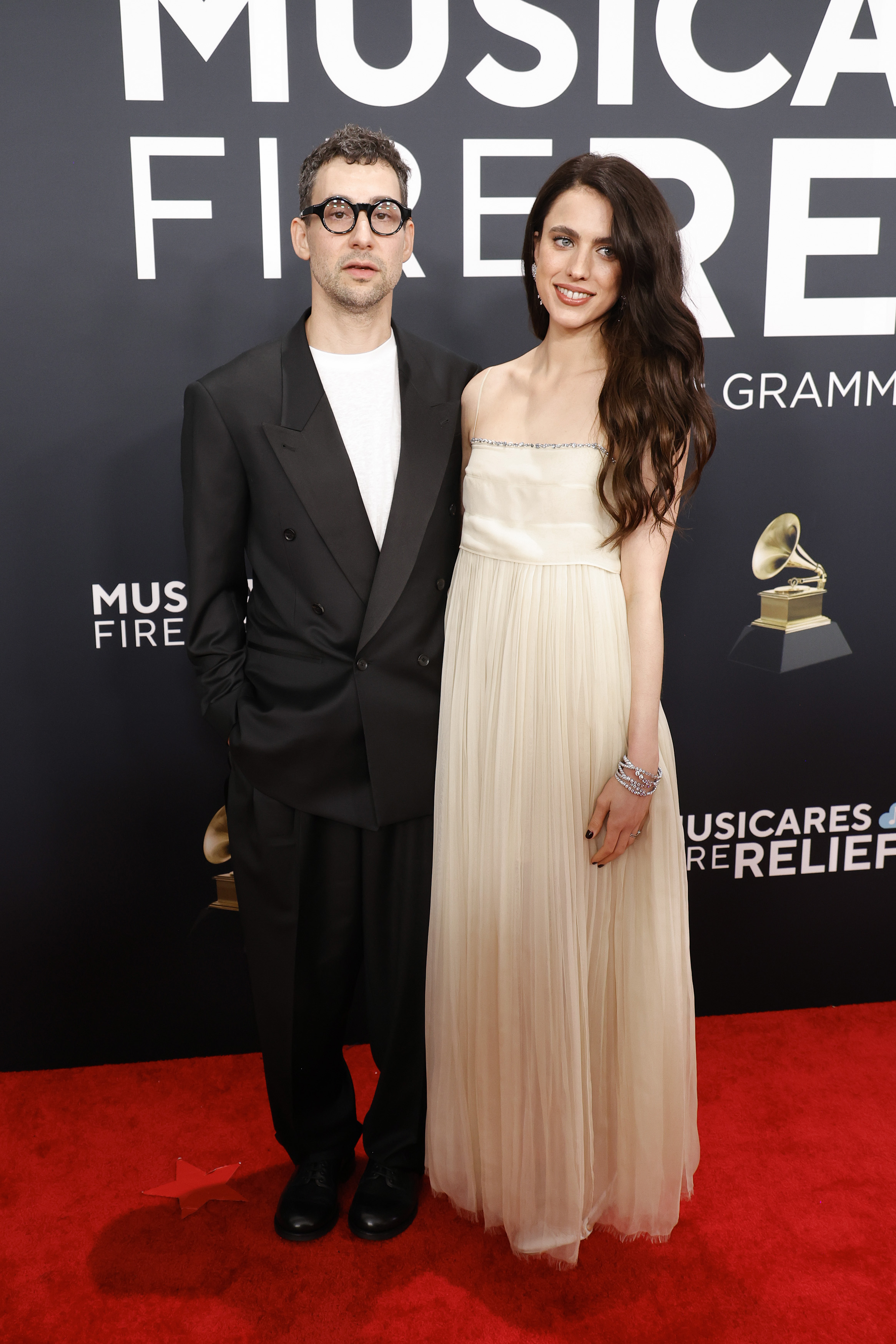 LOS ANGELES, CALIFORNIA - FEBRUARY 02: (FOR EDITORIAL USE ONLY) (L-R) Jack Antonoff and Margaret Qualley attend the 67th GRAMMY Awards on February 02, 2025 in Los Angeles, California. (Photo by Frazer Harrison/Getty Images)
