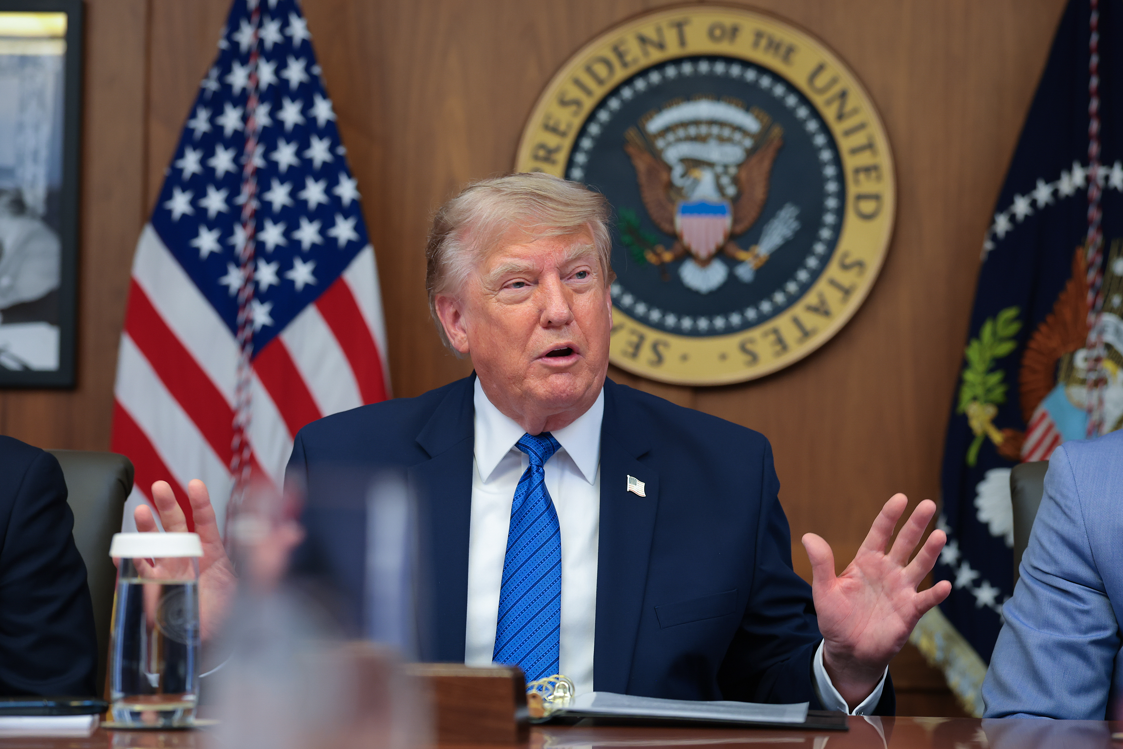 President Donald Trump answers questions from reporters during a Cabinet meeting at Camp David, the presidential retreat, on July 31, 2026 in Camp David, Maryland (Getty Images)