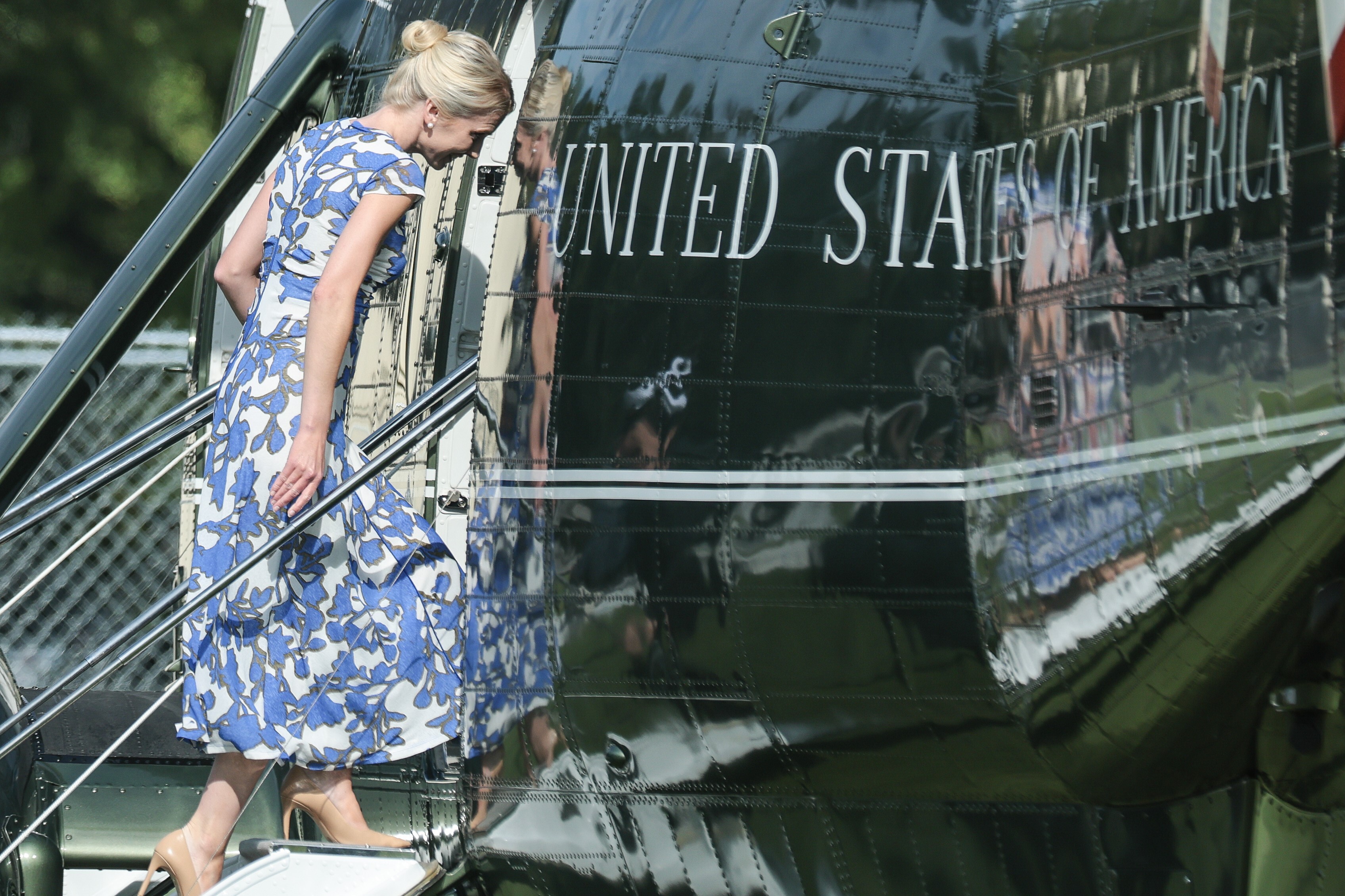 Executive assistant to U.S. President Donald Trump Natalie Harp boards Marine One on the Ellipse near the White House on August 21, 2026 in Washington, DC. President Trump is traveling to South...