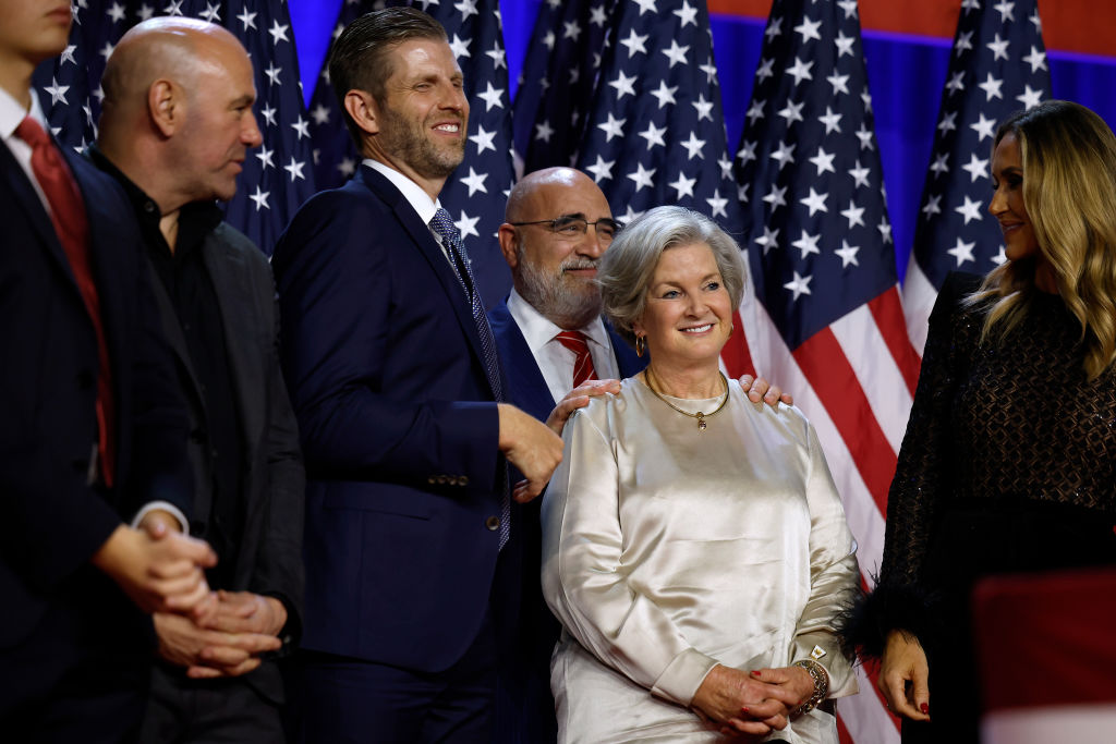 WEST PALM BEACH, FLORIDA - NOVEMBER 05: Chris LaCivita (3rd L) and Susie Wiles (4th L), senior advisors to Republican presidential nominee, former U.S. President Donald Trump's campaign, are recognized for their work during an election night event at the Palm Beach Convention Center on November 06, 2024 in West Palm Beach, Florida. Americans cast their ballots today in the presidential race between Republican nominee former President Donald Trump and Vice President Kamala Harris, as well as multiple state elections that will determine the balance of power in Congress. (Photo by Chip Somodevilla/Getty Images)