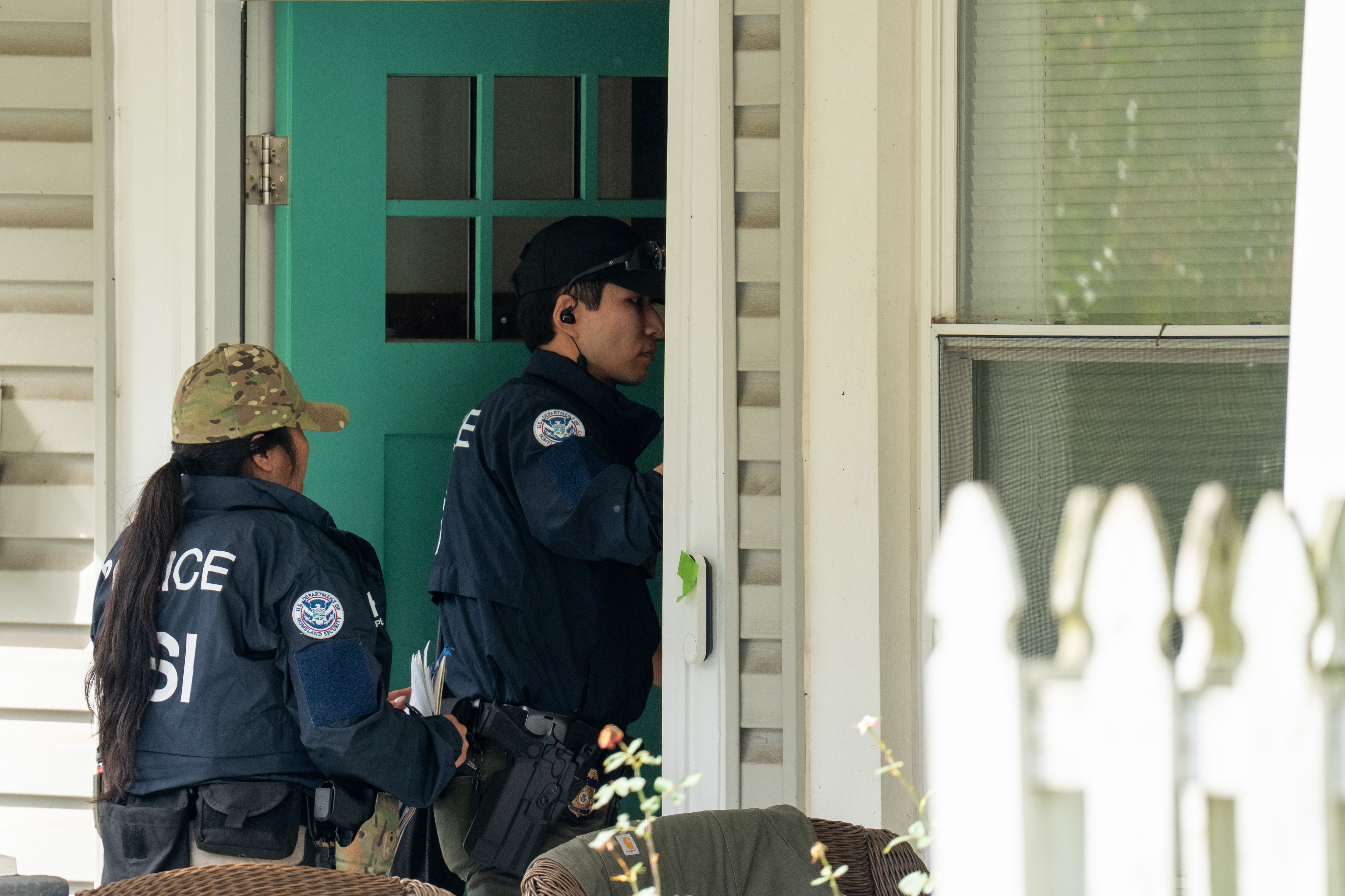 WASHINGTON, DC - OCTOBER 12: Homeland Security Investigations police search the home of Rep. Ilhan Omar (D-MN) on October 12, 2026 in Washington, DC. According to reports, the search is part of an ongoing criminal investigation. (Photo by Andrew Leyden/Getty Images)