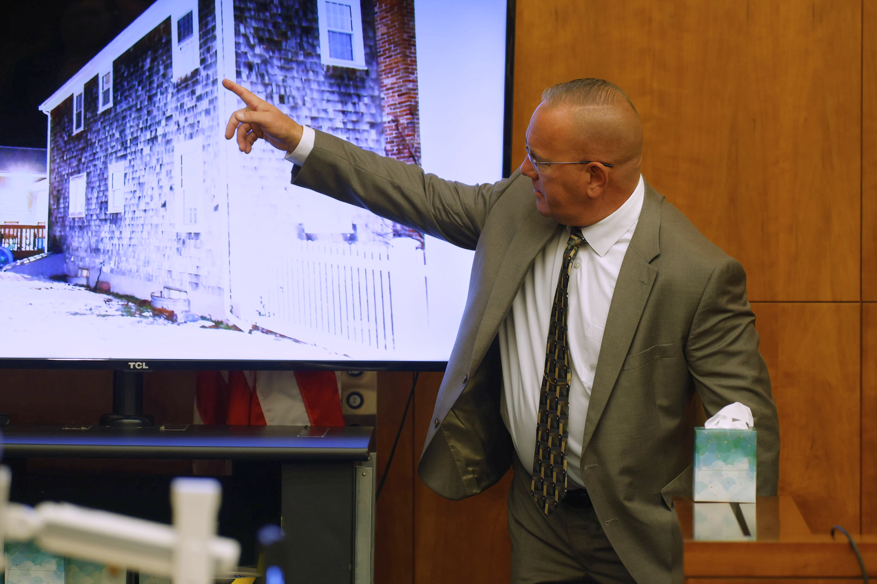 Duxbury fire department Capt. PJ Hussey points to photograph as he testifies during the murder trial for Lindsay Clancy at Plymouth Superior Court in Plymouth, Mass., on Thursday, July 30, 2026. (CJ Gunther/The Boston Herald via AP, Pool)