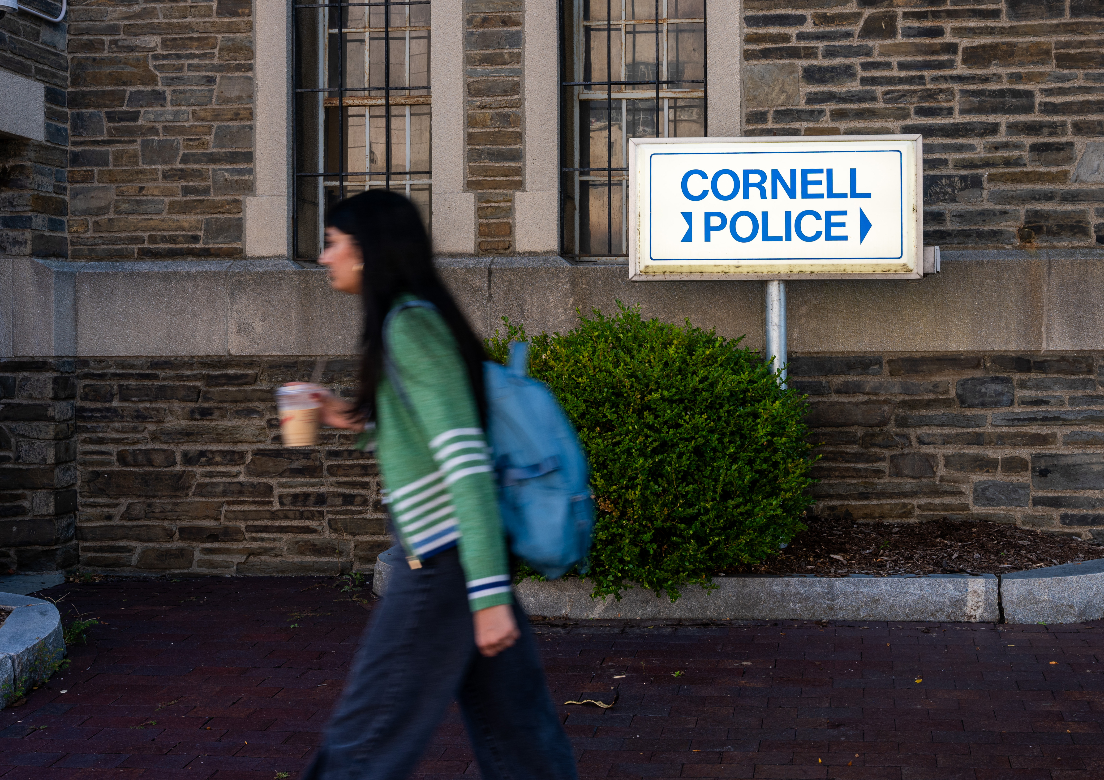 ITHACA, NEW YORK - SEPTEMBER 30: A student walks past Cornell Police headquarters on the Cornell University campus on September 30, 2026, in Ithaca, New York. The New York state attorney general has announced a review of the university’s initial response to allegations by a former Cornell student that she was raped at a campus fraternity in 2024. The student, who is being identified only as Jane Doe, has alleged she was drugged and gang-raped inside the Chi Phi fraternity house on October 19, 2024. (Photo by Spencer Platt/Getty Images)