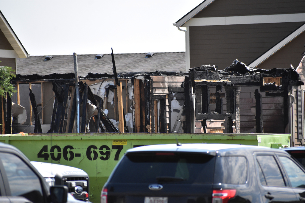 A house where a family was killed is seen, Tuesday Aug. 25, 2026, in Billings Mont. (AP Photo/Matthew Brown)