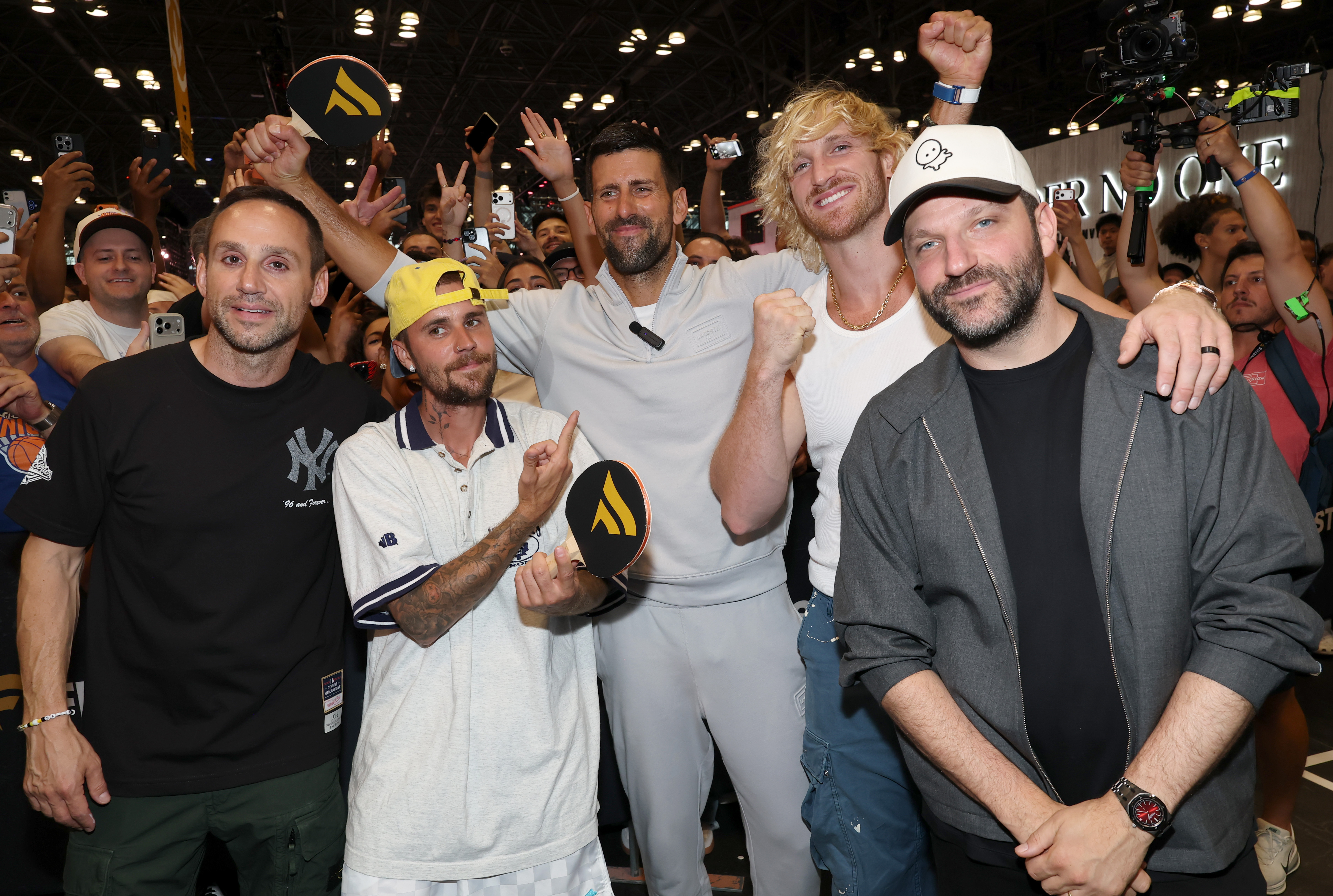 Michael Rubin, Justin Bieber, Novak Djokovic, Logan Paul, and Michael Ratner attend the Fanatics Fest NYC 2026 at Jacob Javits Center on July 18, 2026 in New York City.