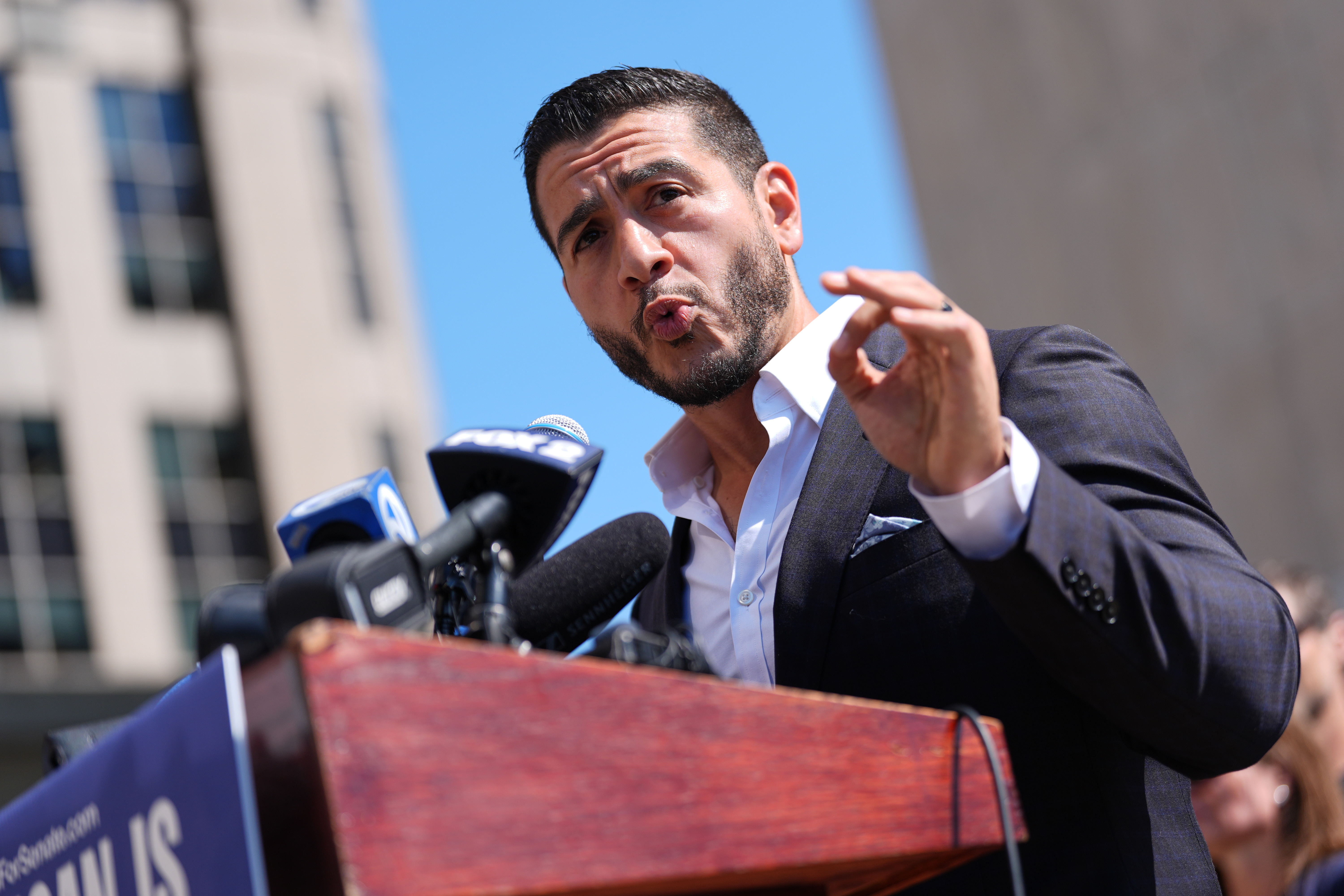 Abdul El-Sayed speaks during a news conference at the Spirit of Detroit shortly after winning the Democratic nomination for U.S. Senate in Michigan, Wednesday, Aug. 5, 2026, in Detroit. (AP Photo/Julia Demaree Nikhinson)