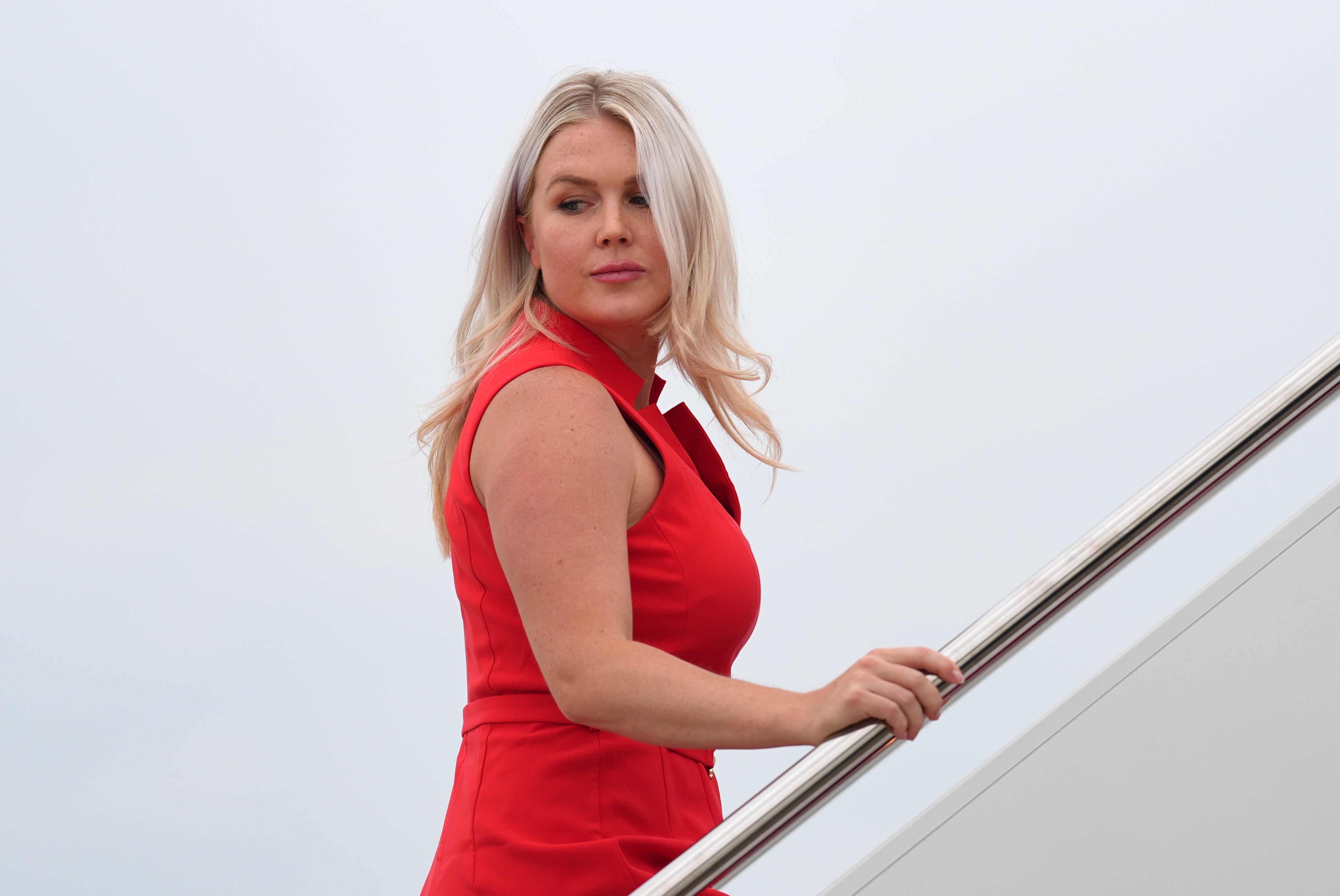 White House press secretary Karoline Leavitt boards Air Force One, Friday, Aug. 14, 2026, at Joint Base Andrews, Md. (AP Photo/Julia Demaree Nikhinson)