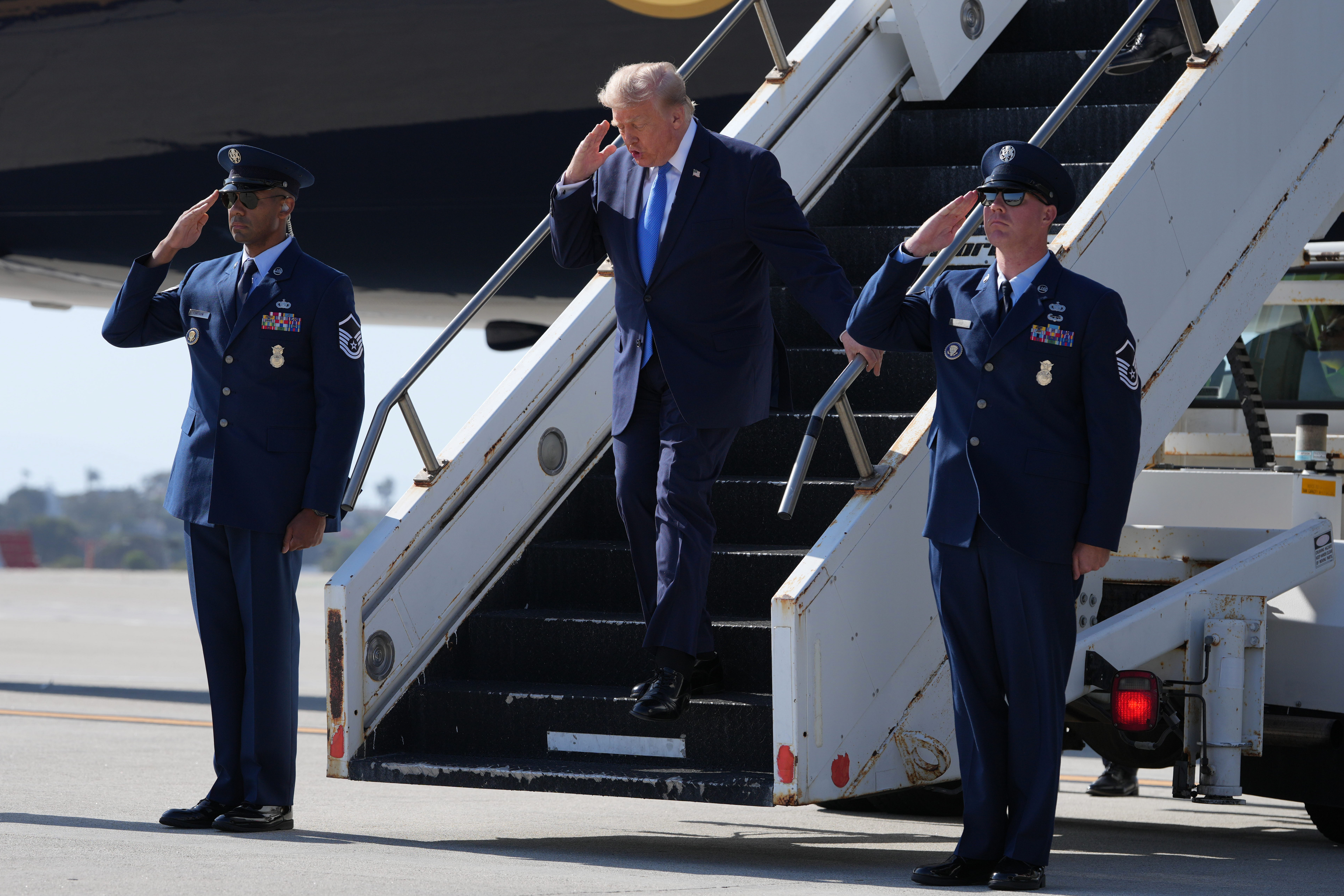 President Donald Trump arrives on Air Force One, Tuesday, Aug. 4, 2026, at Los Angeles International Airport in Los Angeles. (AP Photo/Mark Schiefelbein)