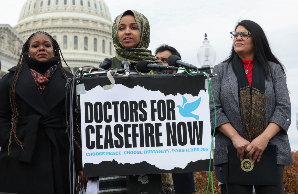 WASHINGTON, DC - DECEMBER 07: (L-R) U.S. Rep. Rashida Tlaib (D-MI), Rep. Ilhan Omar (D-MN) and Rep. Cori Bush (D-MO) speak at a press conference on the Israel-Hamas war outside of the U.S. Capitol on December 07, 2023 in Washington, DC. A group of Democratic lawmakers joined by members of Doctors Against Genocide called on a permanent ceasefire in Gaza.  (Photo by Kevin Dietsch/Getty Images)