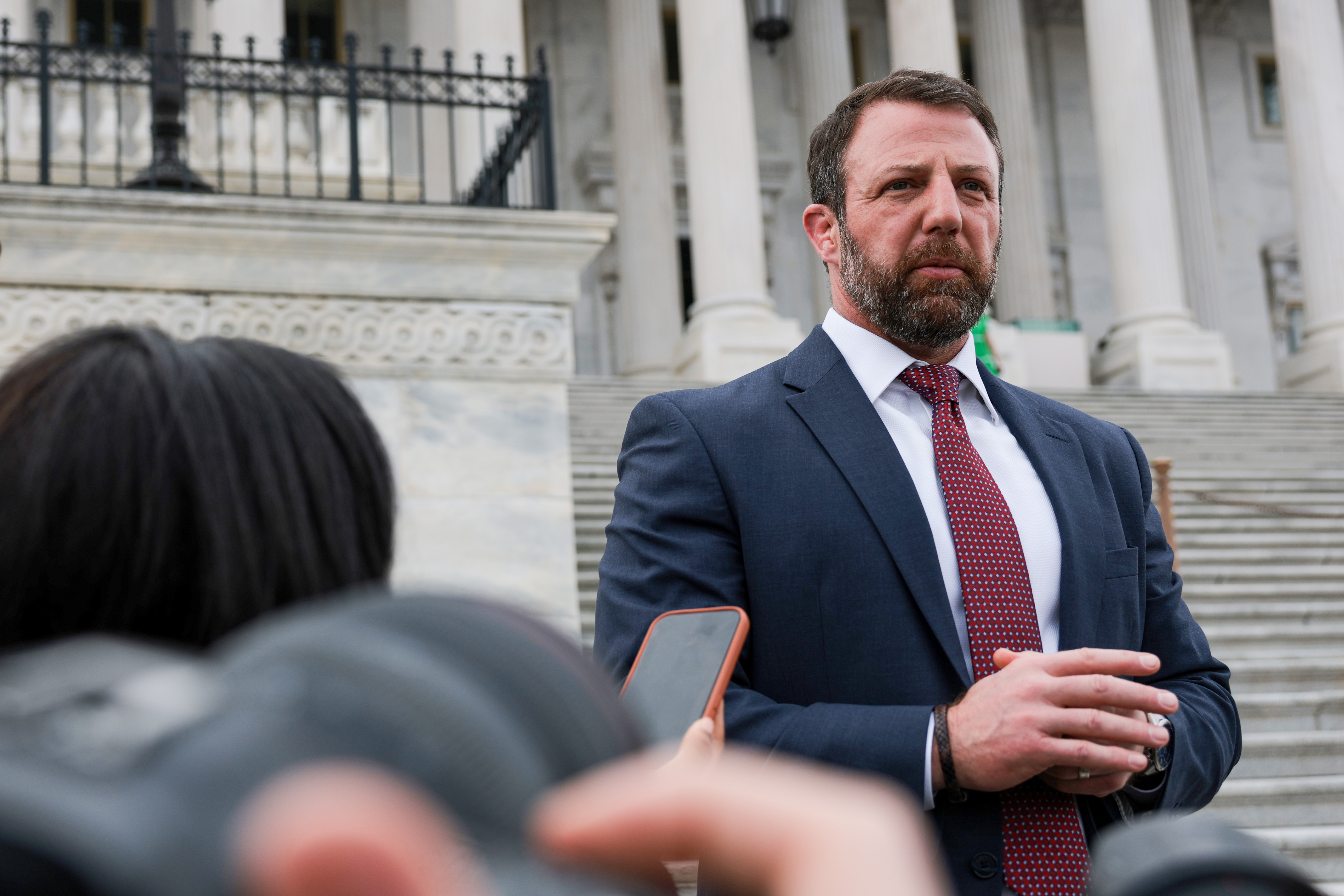 WASHINGTON, DC - MARCH 05: U.S. Sen. Markwayne Mullin (R-OK) speaks to reporters outside of the U.S. Capitol Building on March 05, 2026 in Washington, DC. Earlier today U.S. President Donald Trump announced on Truth Social his intention to nominate Mullin to replace U.S. Secretary of Homeland Security Kristi Noem. (Photo by Anna Moneymaker/Getty Images)
