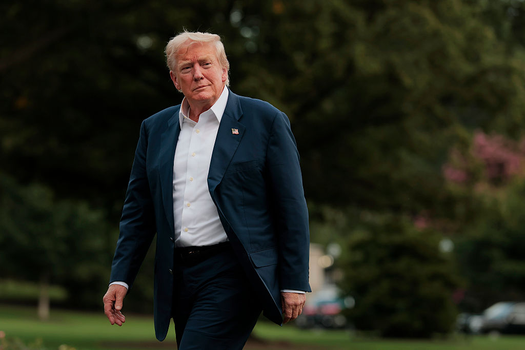 WASHINGTON, DC - JULY 29: U.S. President Donald Trump walks across the South Lawn of the White House after returning on Marine One on July 29, 2025 in Washington, DC. President Trump returned to the White House with his family after a trip to Scotland that was part vacation, part work, as he stayed at his Trump Turnberry golf course, followed by Trump International Golf Links in Aberdeenshire, from July 25 to 29. (Photo by Anna Moneymaker/Getty Images)