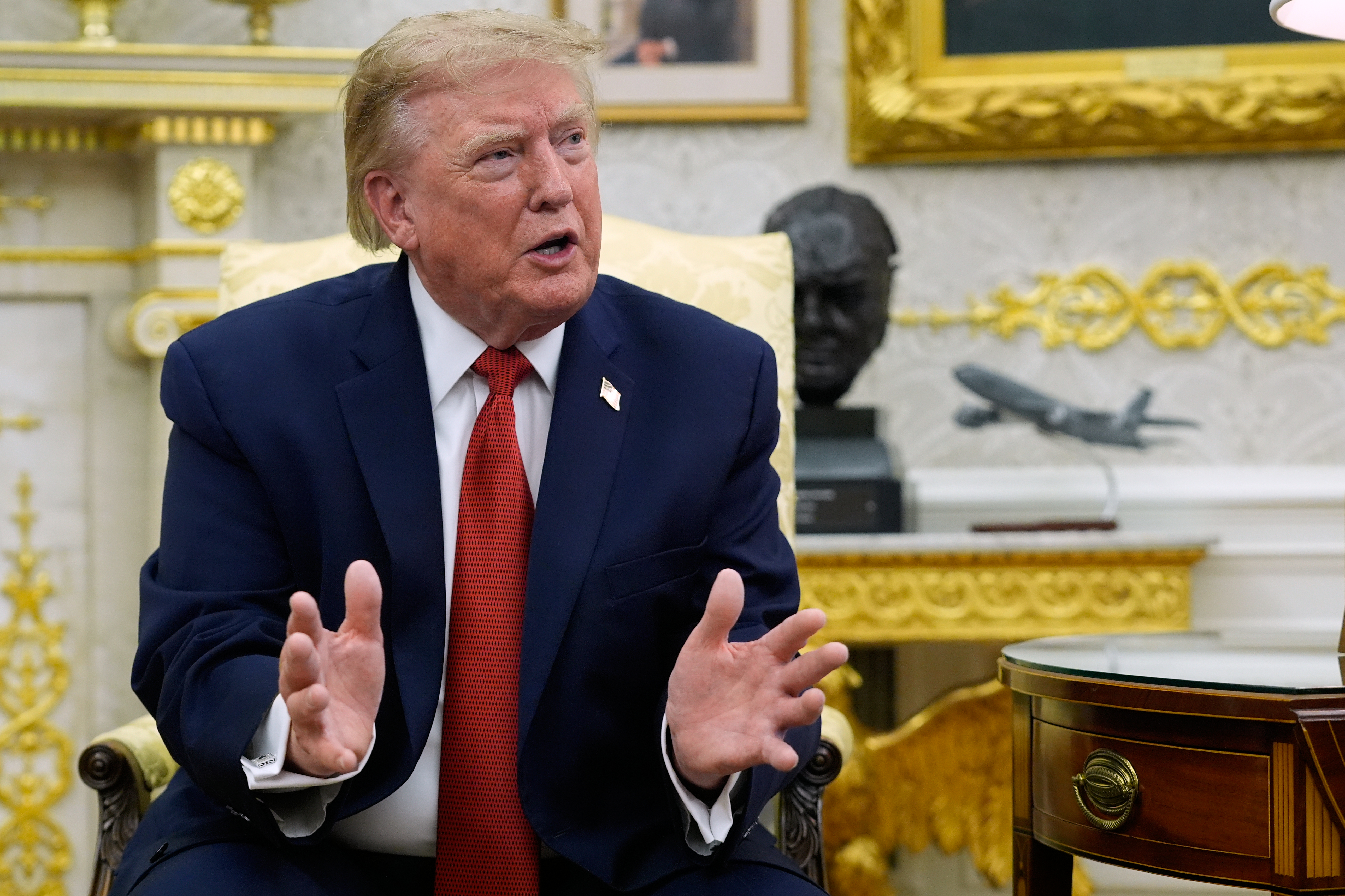President Donald Trump speaks as he meets with lifeguard Ryder Williams in the Oval Office of the White House, Monday, Aug. 17, 2026, in Washington. (AP Photo/Manuel Balce Ceneta)