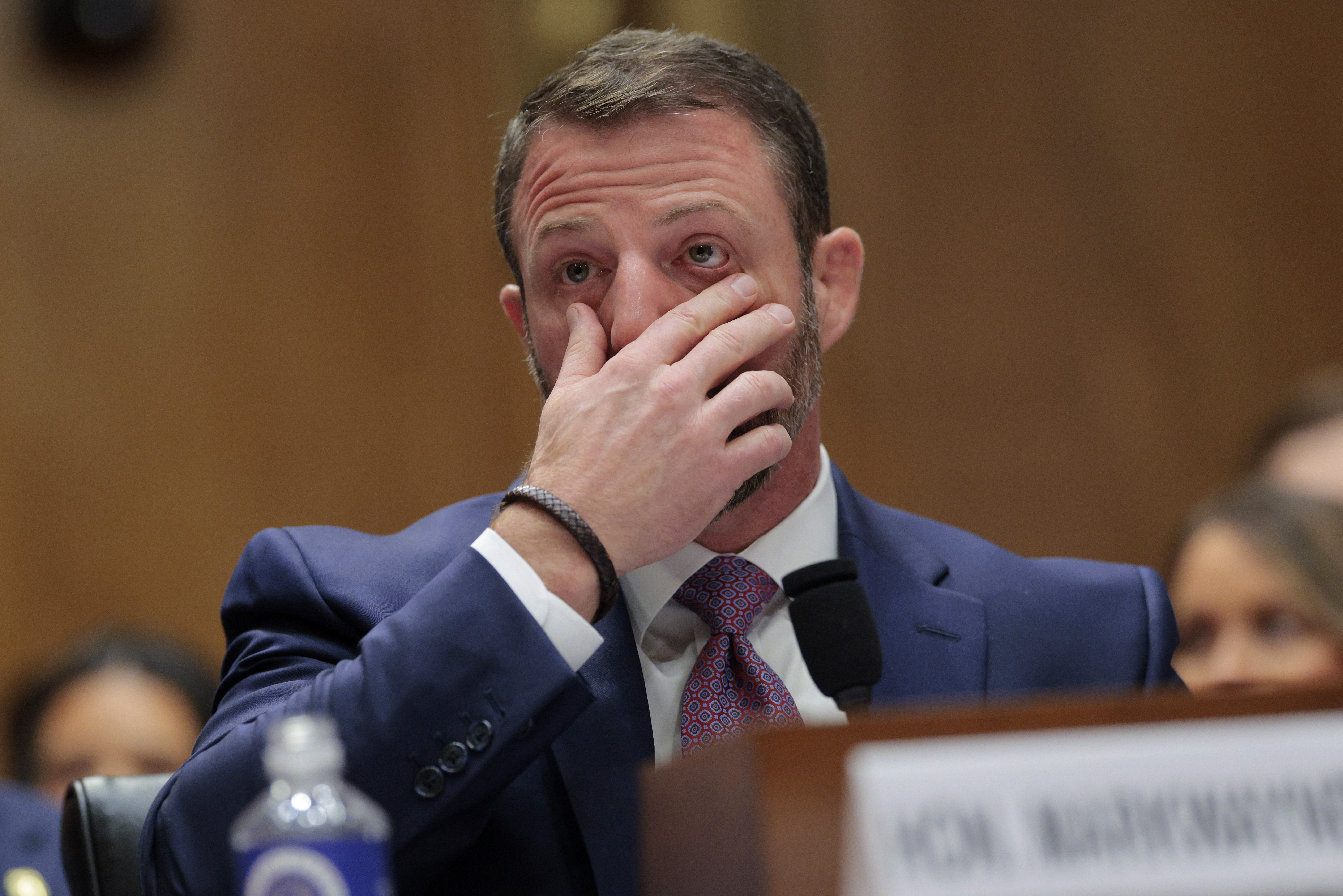 WASHINGTON, DC - MARCH 18: U.S. Sen. Markwayne Mullin (R-OK) becomes emotional as he testifies during a confirmation hearing to be the next Secretary of the Department of Homeland Security in the Dirksen Senate Office Building on March 18, 2026 in Washington, DC. President Trump nominated Mullin to replace Kristi Noem as DHS Secretary. (Photo by Chip Somodevilla/Getty Images)