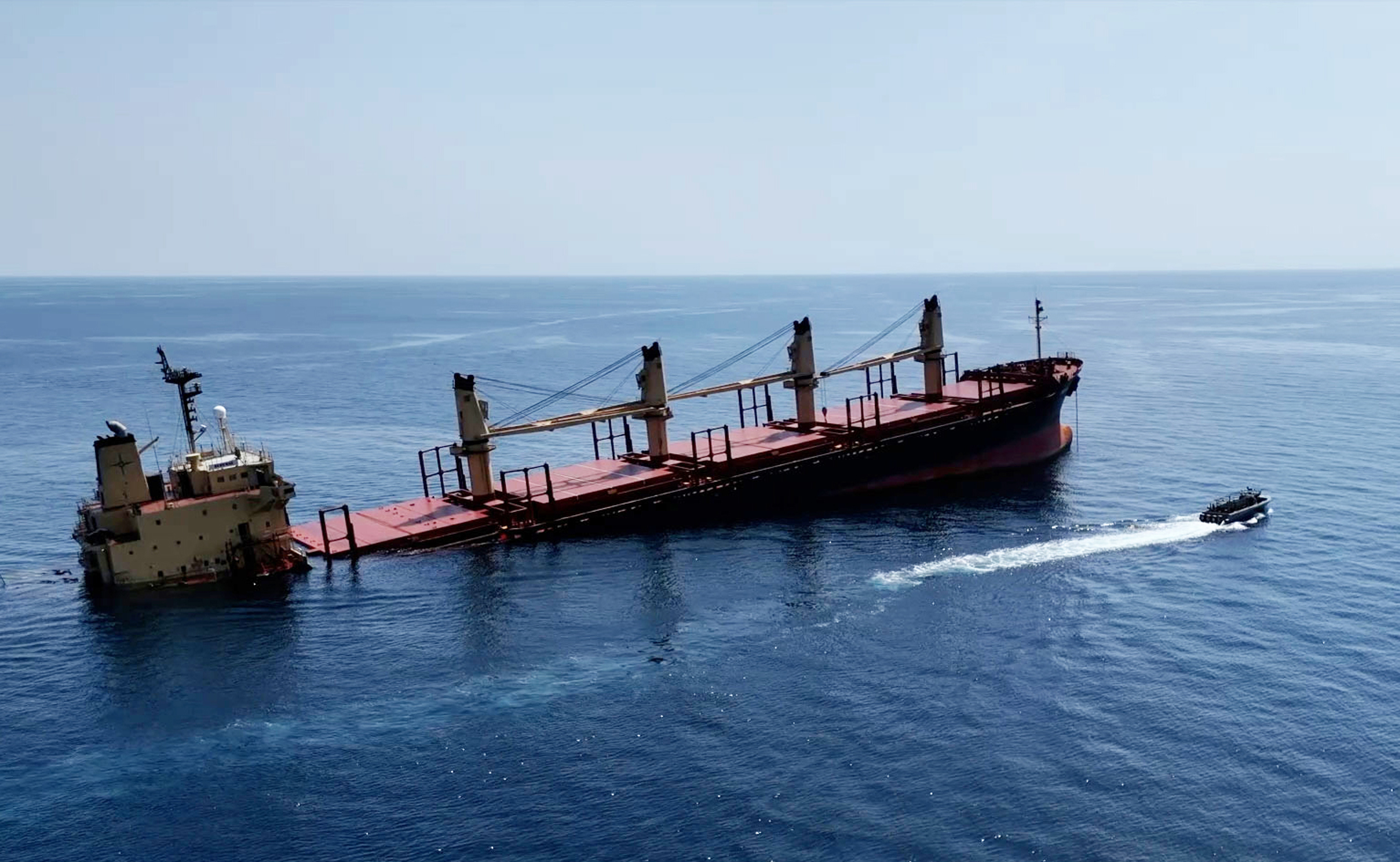AT SEA - MARCH 3: (EDITORS NOTE: Best quality available) This handout photo provided by Yemeni Al-Joumhouria TV, shows the British-registered cargo ship 'Rubymar' sinking, after it was targeted by Yemen's Houthi forces in international waters in the Red Sea, on March 3, 2024, in the Red Sea. (Photo by Al-Joumhouriah channel via Getty Images)