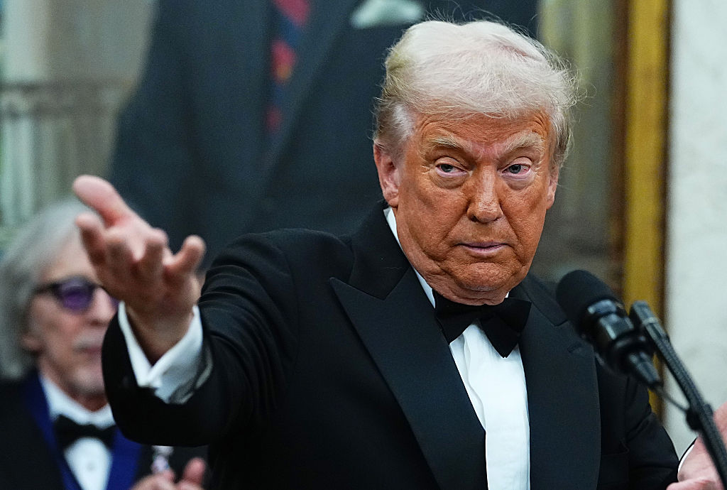 WASHINGTON, DC - DECEMBER 06: U.S. President Donald Trump delivers remarks during the medal presentation ceremony for the 2025 Kennedy Center Honorees in the Oval Office of the White House on December 06, 2025 in Washington, DC. The 2025 Kennedy Center honorees are Sylvester Stallone, George Strait, the rock band KISS, Gloria Gaynor, and Michael Crawford. (Photo by Aaron Schwartz/Getty Images)