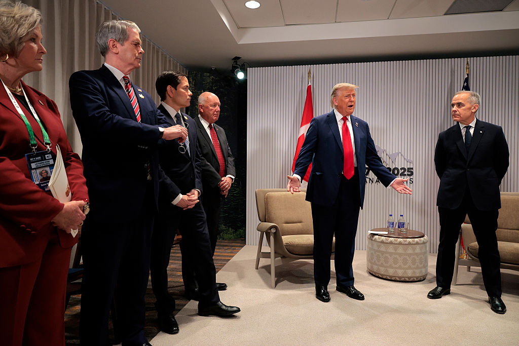 KANANASKIS, ALBERTA - JUNE 16: U.S. President Donald Trump and Canadian Prime Minister Mark Carney hold a bilateral meeting during the G7 Leaders' Summit on June 16, 2025 in Kananaskis, Alberta. Canada is hosting this year's meeting of the world's seven largest economies. Trump and Carney were joined by (L-R) White House Chief of Staff Susie Wiles, U.S. Treasury Secretary Scott Bessent, Secretary of State Marco Rubio and U.S. Ambassador to Canada Pete Hoekstra. (Photo by Chip Somodevilla/Getty Images)