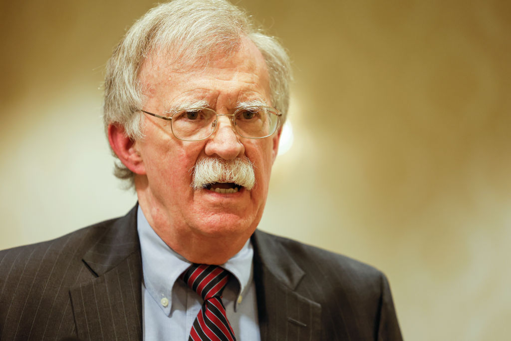 WASHINGTON, DC - AUGUST 17: Former National Security Adviser John Bolton speaks to reporters after speaking in a panel hosted by the National Council of Resistance of Iran – U.S. Representative Office (NCRI-US) at the Willard InterContinental Hotel on August 17, 2022 in Washington, DC. The NCRI-US held the panel to mark the 20th anniversary of their first press conference on the perceived threat of Iran’s nuclear weapons program. Recently the U.S. Justice Department announced charges against an Iranian operative for a plot to murder John Bolton. (Photo by Anna Moneymaker/Getty Images)