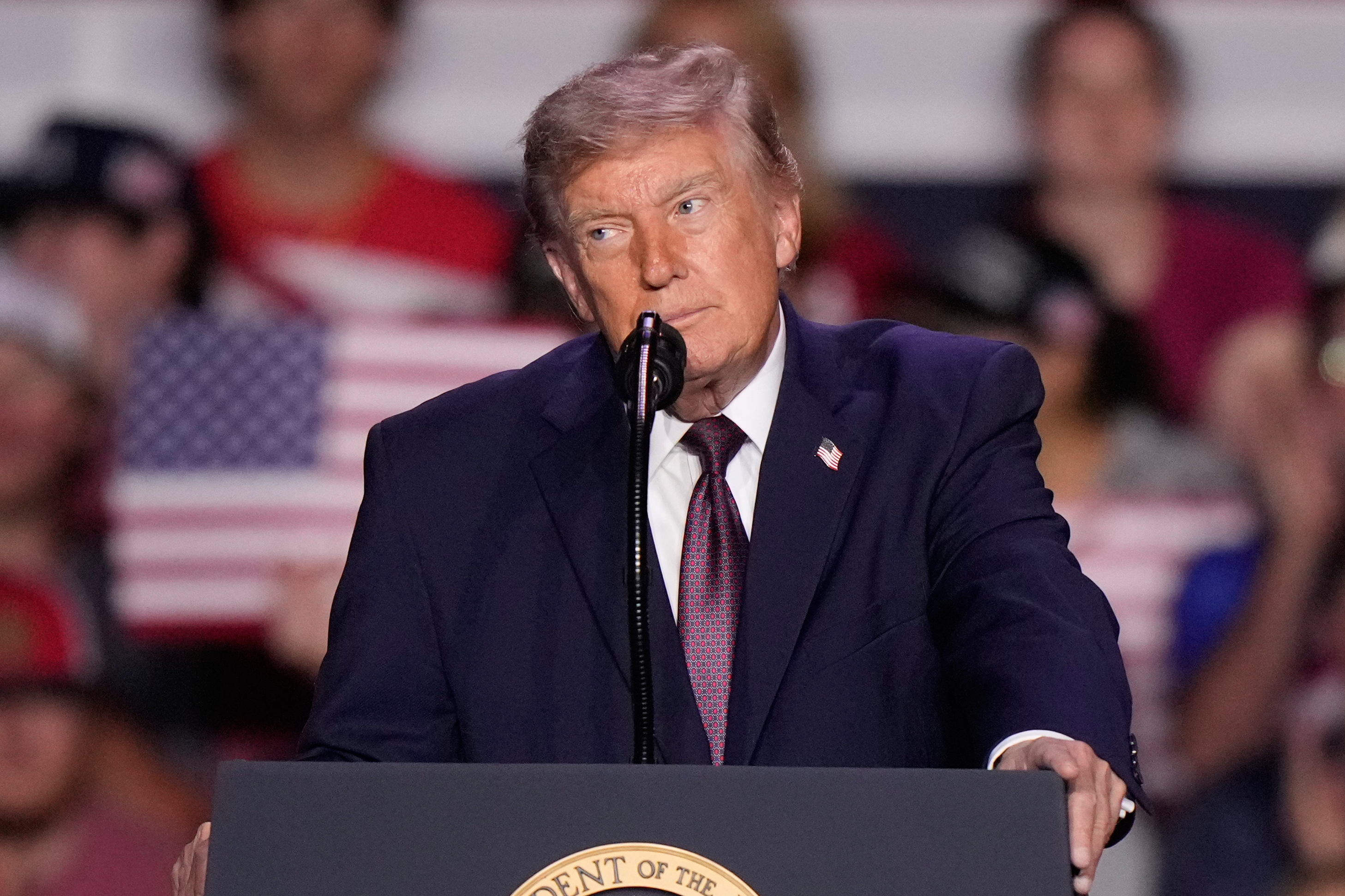 President Donald Trump speaks at a campaign rally at The Mitchell Center in Mobile, Ala., Friday, Oct. 2, 2026. (AP Photo/Gerald Herbert)