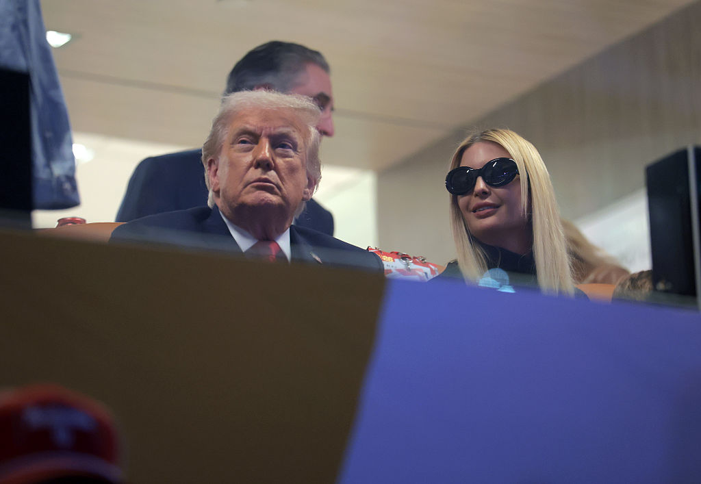MIAMI GARDENS, FLORIDA - JANUARY 19: U.S. President Donald Trump and his daughter Ivanka Trump (R) attend the College Football Playoff National Championship game at Hard Rock Stadium on January 19, 2026 in Miami Gardens, Florida. This year’s College Football Playoff National Championship game is between the Indiana Hoosiers and the Miami Hurricanes. (Photo by Anna Moneymaker/Getty Images)