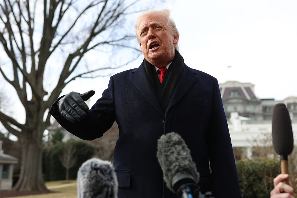 WASHINGTON, DC - JANUARY 16: U.S. President Donald Trump speaks to members of the press before boarding Marine One on the South Lawn of the White House on January 16, 2026 in Washington, DC. Trump is traveling to Palm Beach, Florida where he will attend a dedication ceremony to rename part of the city's Southern Boulevard before remaining at his Mar-a-Lago property throughout the holiday weekend. (Photo by Tom Brenner/Getty Images)