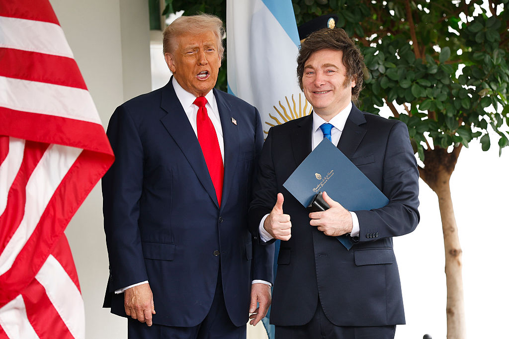 WASHINGTON, DC - OCTOBER 14: U.S. President Donald Trump (L) greets President of Argentina Javier Milei as he arrives at the West Wing of the White House on October 14, 2025 in Washington, DC. Trump is hosting Milei for a working lunch days after the U.S. Treasury finalized a $20 billion currency swap framework with Argentina in an effort to help stabilize its economy. (Photo by Kevin Dietsch/Getty Images)