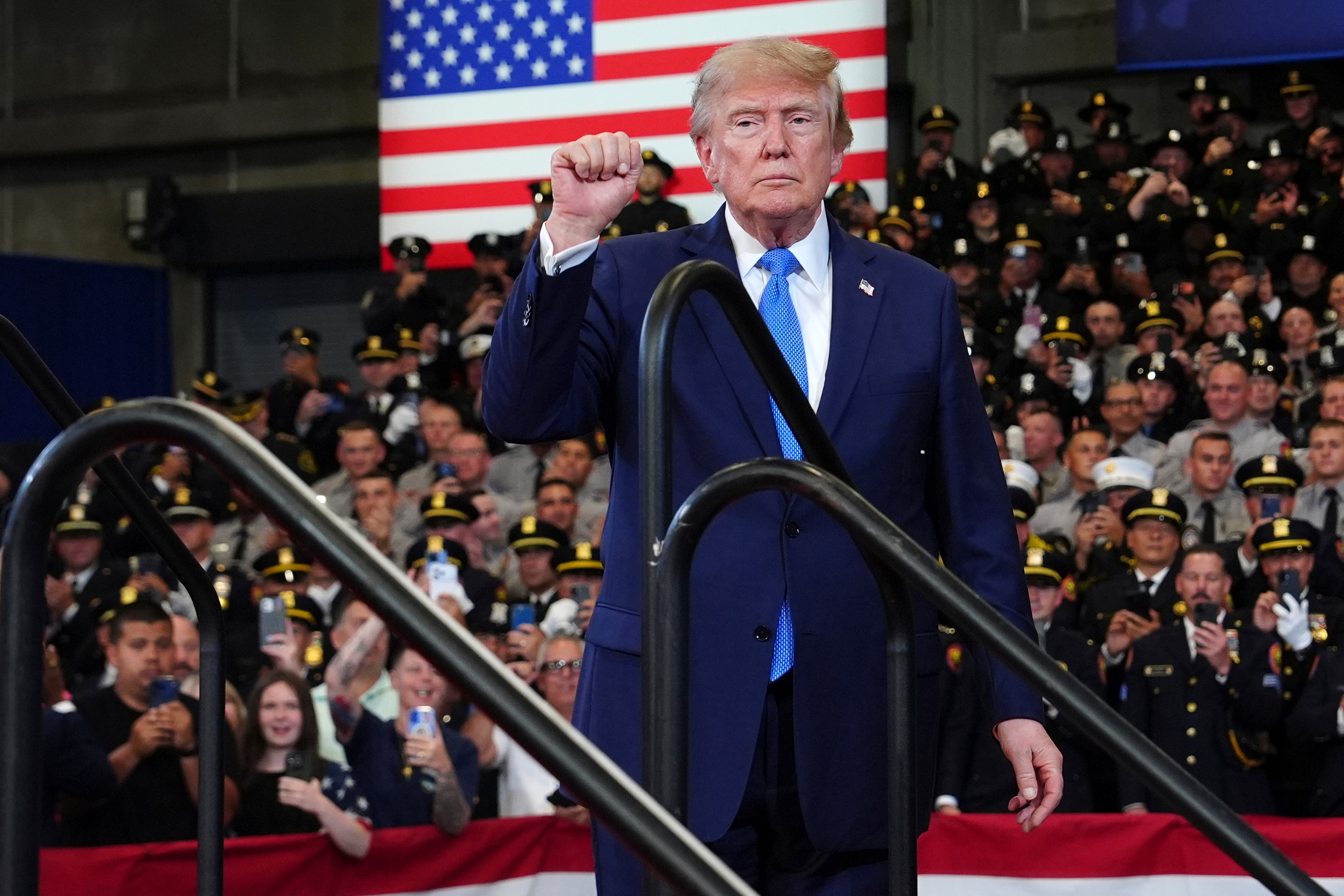 President Donald Trump departs after speaking at the David Mack Center for Training and Intelligence, Friday, Aug. 14, 2026, in Garden City, N.Y. (AP Photo/Julia Demaree Nikhinson)