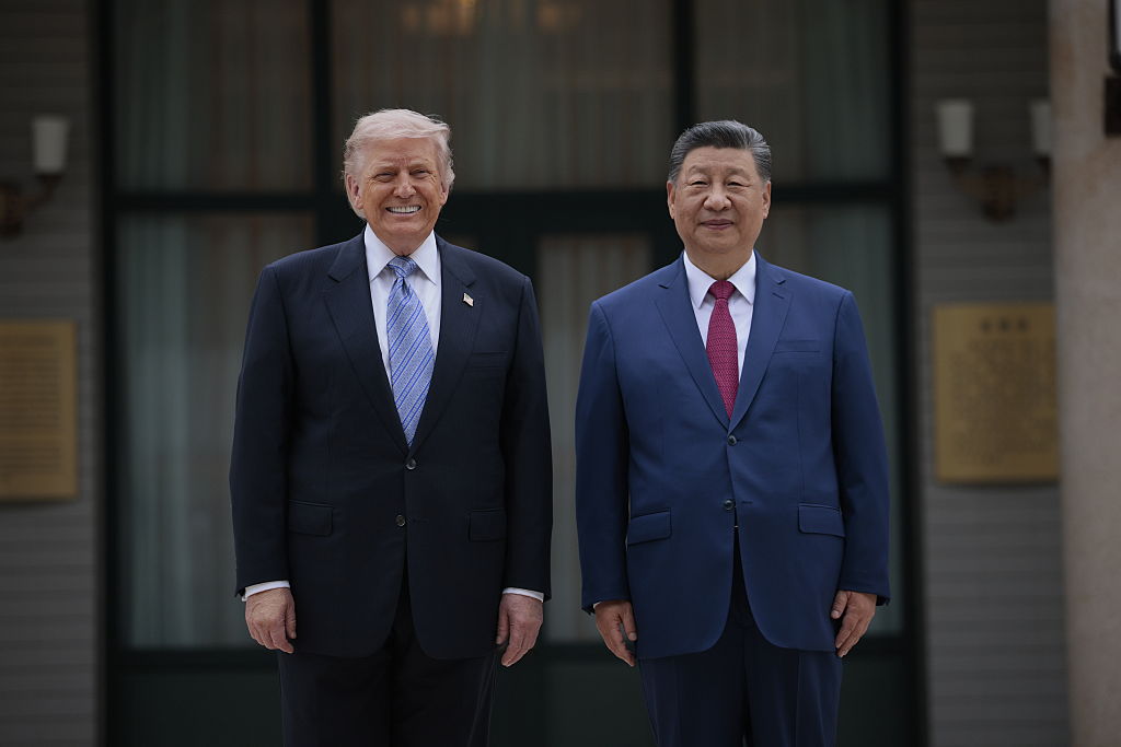 BEIJING, CHINA - MAY 15: U.S. President Donald Trump and Chinese President Xi Jinping pose for photos at Zhongnanhai Garden on May 15, 2026 in Beijing, China. Trump and other U.S. officials are finishing up a visit intended to address the Iran conflict, trade imbalances, and the Taiwan situation while establishing new bilateral boards for economic and AI oversight.  (Photo by Evan Vucci-Pool/Getty Images)