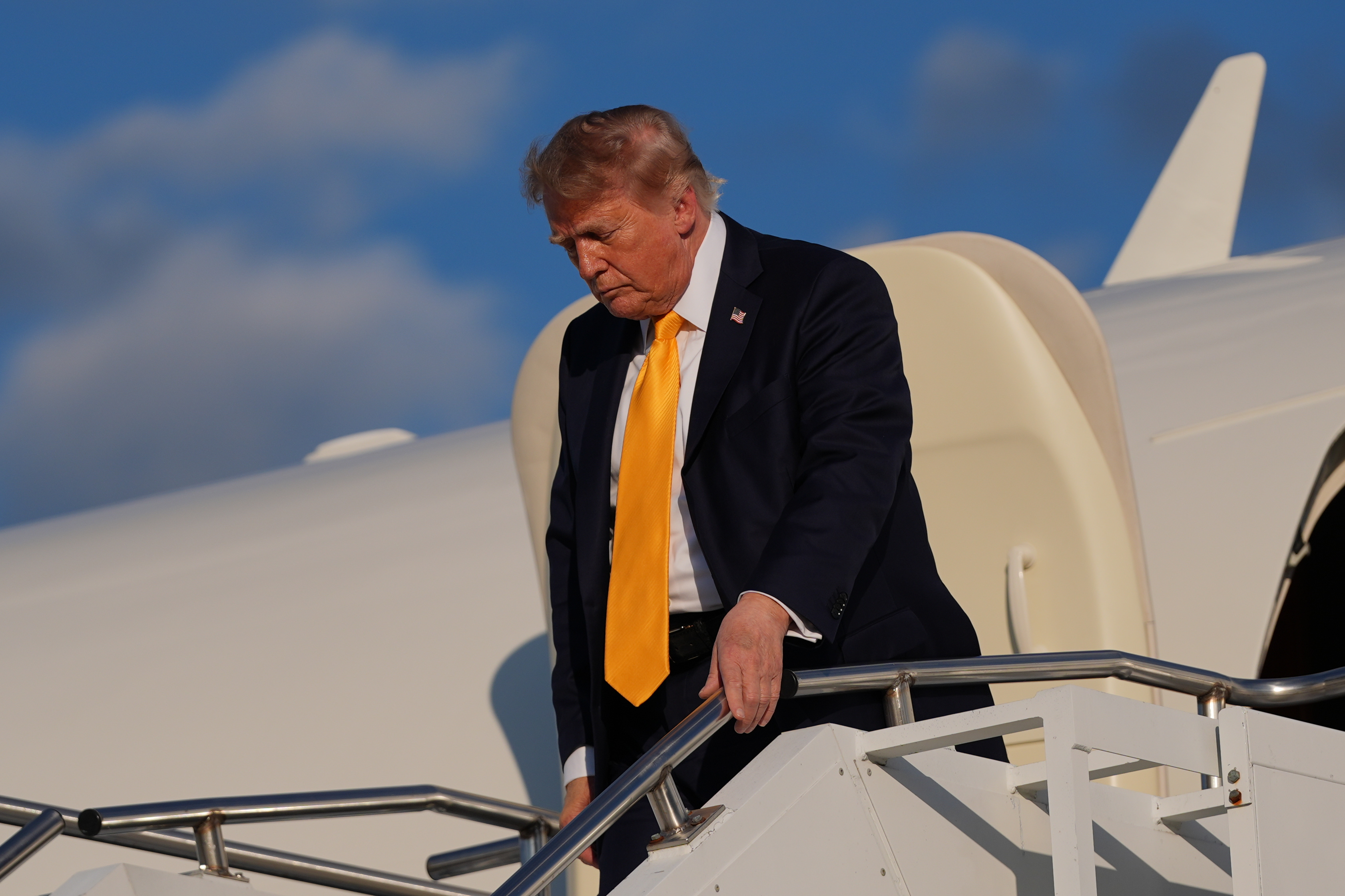 President Donald Trump arrives on Air Force One at Morristown Airport, Friday, Sept. 4, 2026, in Morristown, N.J. (AP Photo/Julia Demaree Nikhinson)