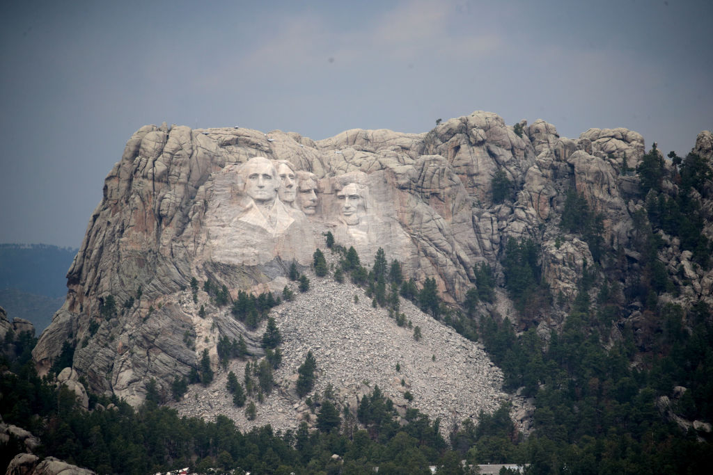 KEYSTONE, SOUTH DAKOTA - JULY 02: The busts of U.S. presidents George Washington, Thomas Jefferson, Theodore Roosevelt and Abraham Lincoln tower over the Black Hills at Mount Rushmore National Monument on July 02, 2020 near Keystone, South Dakota. President Donald Trump is expected to visit the monument and speak before the start of a fireworks display on July 3. (Photo by Scott Olson/Getty Images)