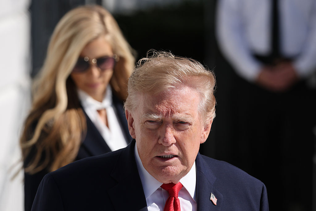 WASHINGTON, DC - OCTOBER 13: U.S. President Donald Trump is followed by White House Press Secretary Katie Zacharia (L) as he departs on the South Lawn of the White House on October 13, 2026 in Washington, DC. President Trump is traveling to Alaska to headline a rally for incumbent Sen. Dan Sullivan (R-AK), who will be facing off against Alaska Democratic Senate candidate, former Rep. Mary Peltola in the midterm elections. (Photo by Win McNamee/Getty Images)
