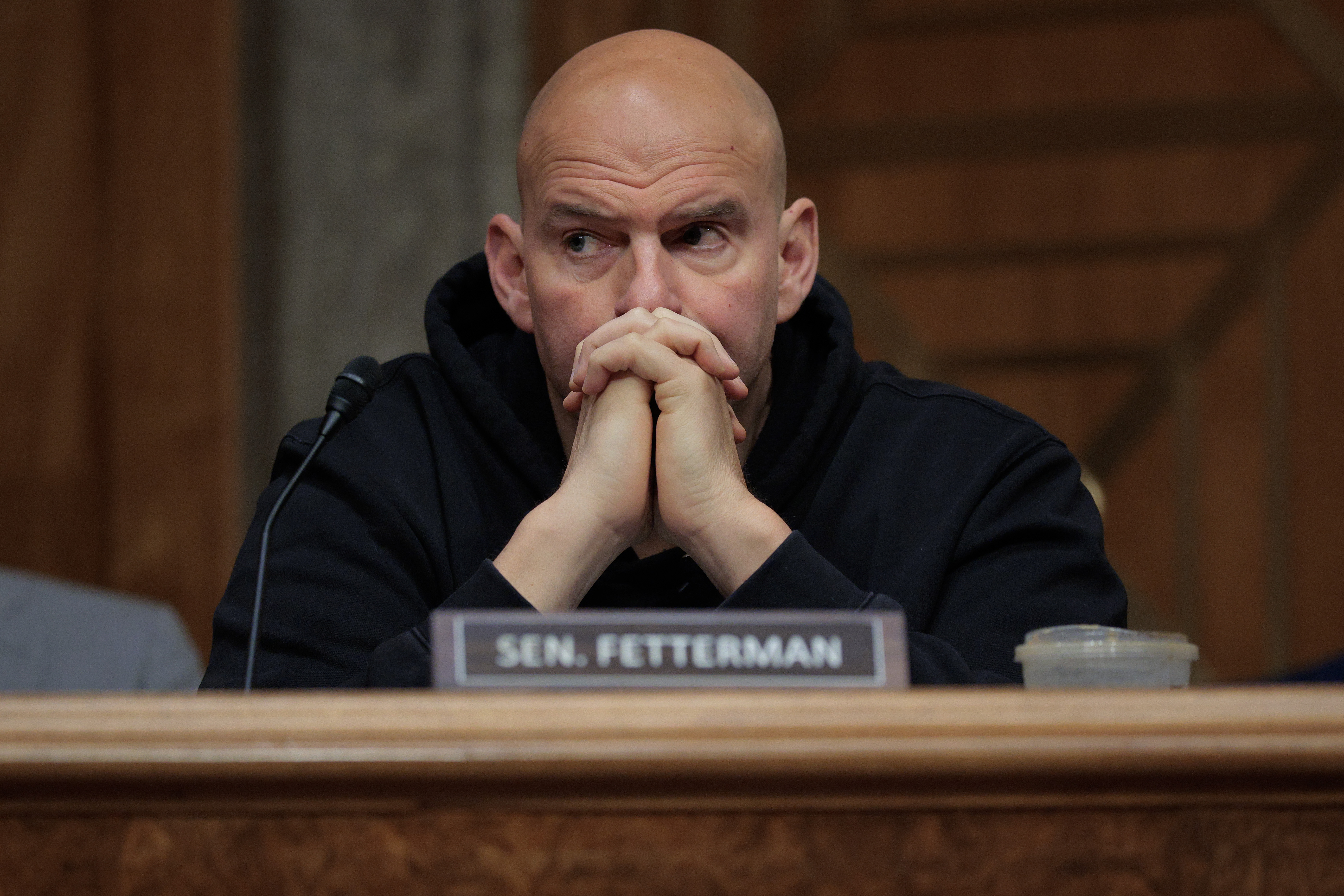WASHINGTON, DC - MARCH 19:  Senate Homeland Security and Governmental Affairs Committee member Sen. John Fetterman (D-WV) votes to advance Sen. Markwayne Mullin (R-OK) to be Secretary of the Department of Homeland Security during a markup hearing in the Dirksen Senate Office Building on Capitol Hill on March 19, 2026 in Washington, DC. Committee Chairman Rand Paul (R-KY) has announced that he does not support President Donald Trump's nomination of Mullin and voted against him.  (Photo by Chip Somodevilla/Getty Images)