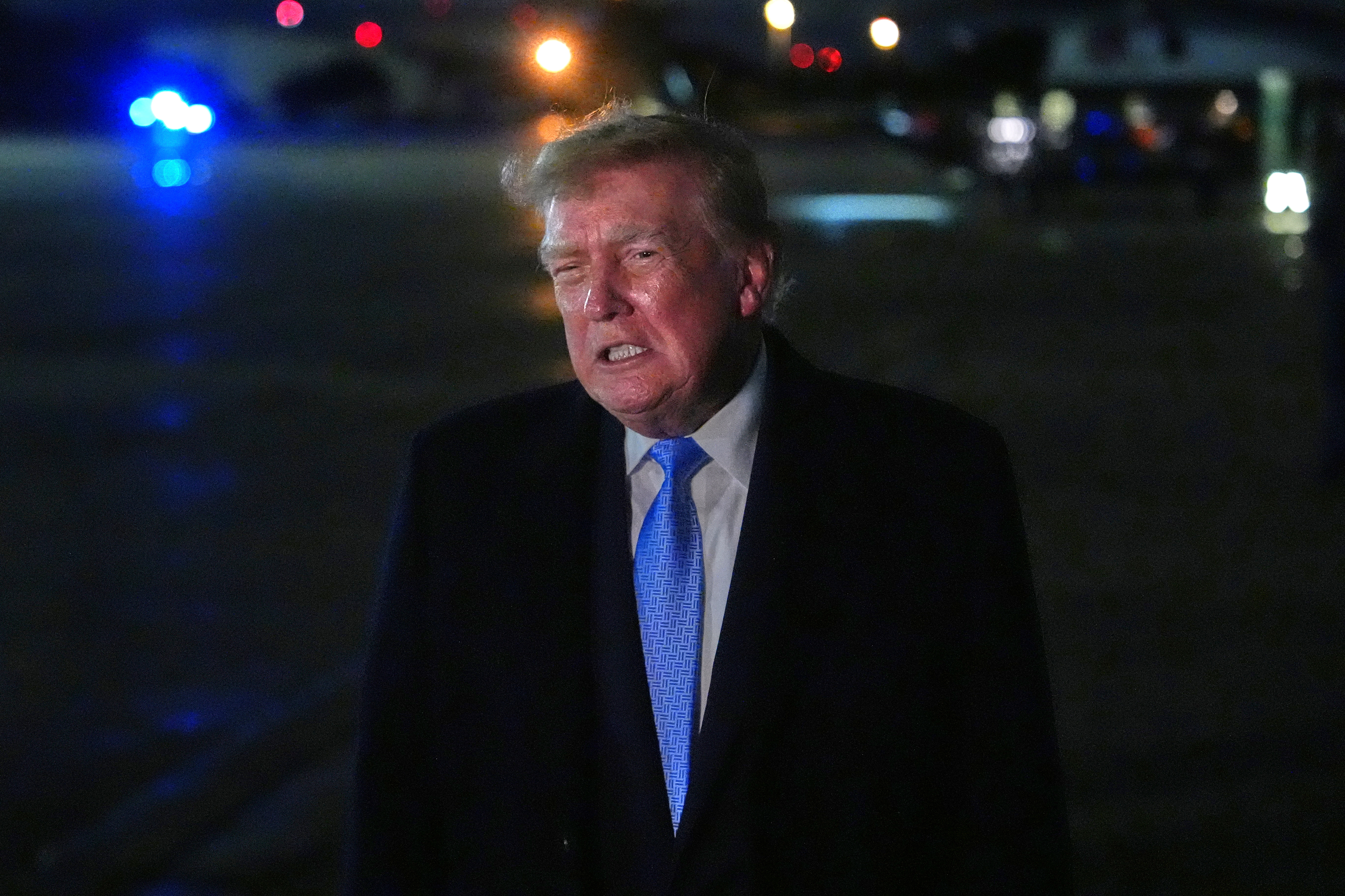 President Donald Trump speaks with reporters upon arriving, Sunday, Sept. 27, 2026, at Joint Base Andrews, Md. (AP Photo/Julia Demaree Nikhinson)