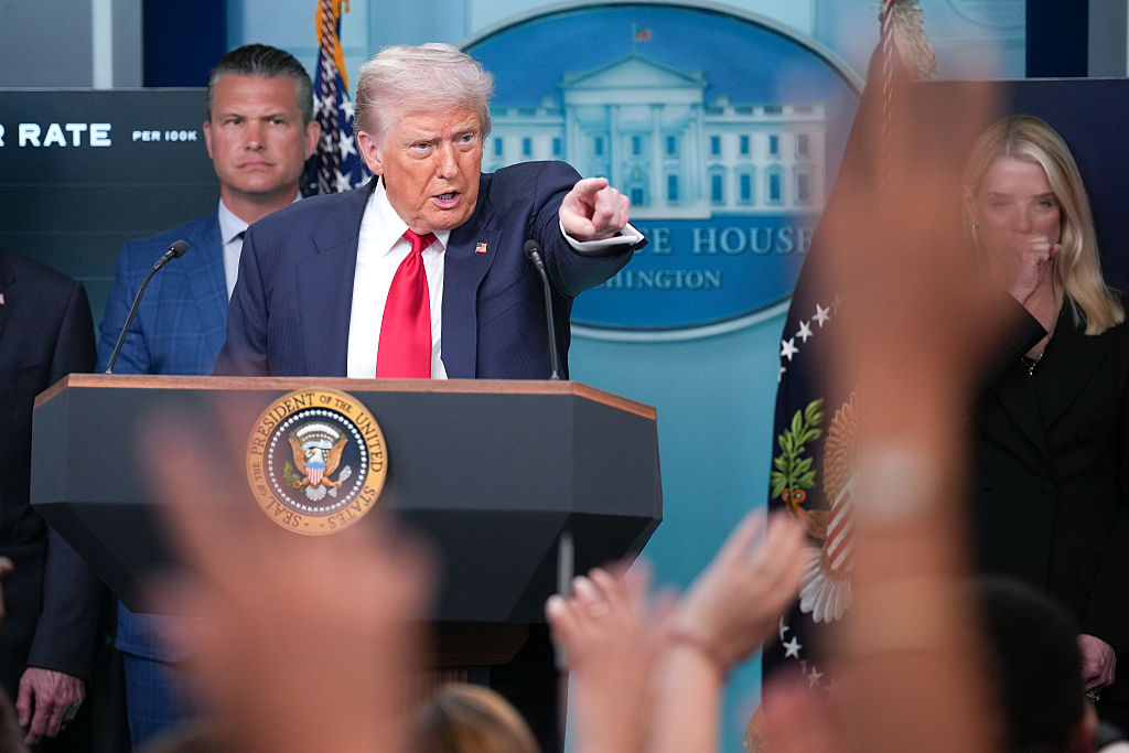 WASHINGTON, DC - AUGUST 11: U.S. President Donald Trump answers questions during a press conference in the James S. Brady Press Briefing Room of the White House August 11, 2025 in Washington, DC. Trump announced he will use his authority to place the DC Metropolitan Police Department under federal control to assist in crime prevention in the nation’s capital, and that the National Guard will be deployed to DC. Also pictured are Secretary of Defense Pete Hegseth (L) and Attorney General Pam Bondi (R). (Photo by Andrew Harnik/Getty Images)