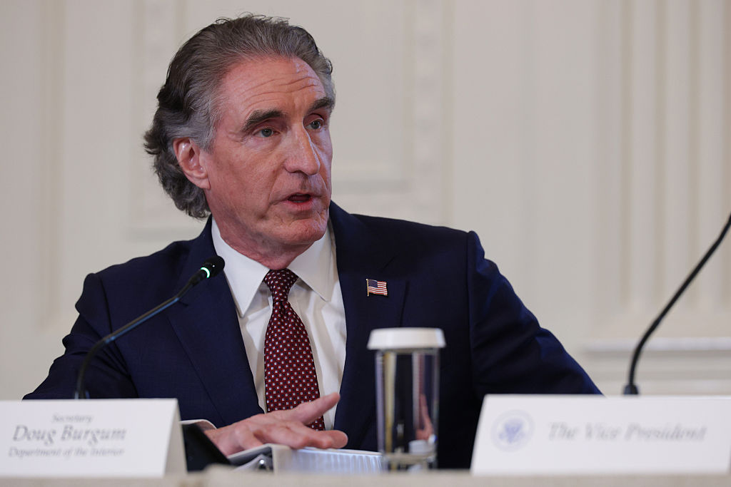 WASHINGTON, DC - JANUARY 09: U.S. Interior Secretary Doug Burgum looks on during a meeting with oil and gas executives in the East Room of the White House on January 9, 2026 in Washington, DC. Trump is holding the meeting to discuss plans for investment in Venezuela after ousting its leader Nicolás Maduro. (Photo by Alex Wong/Getty Images)