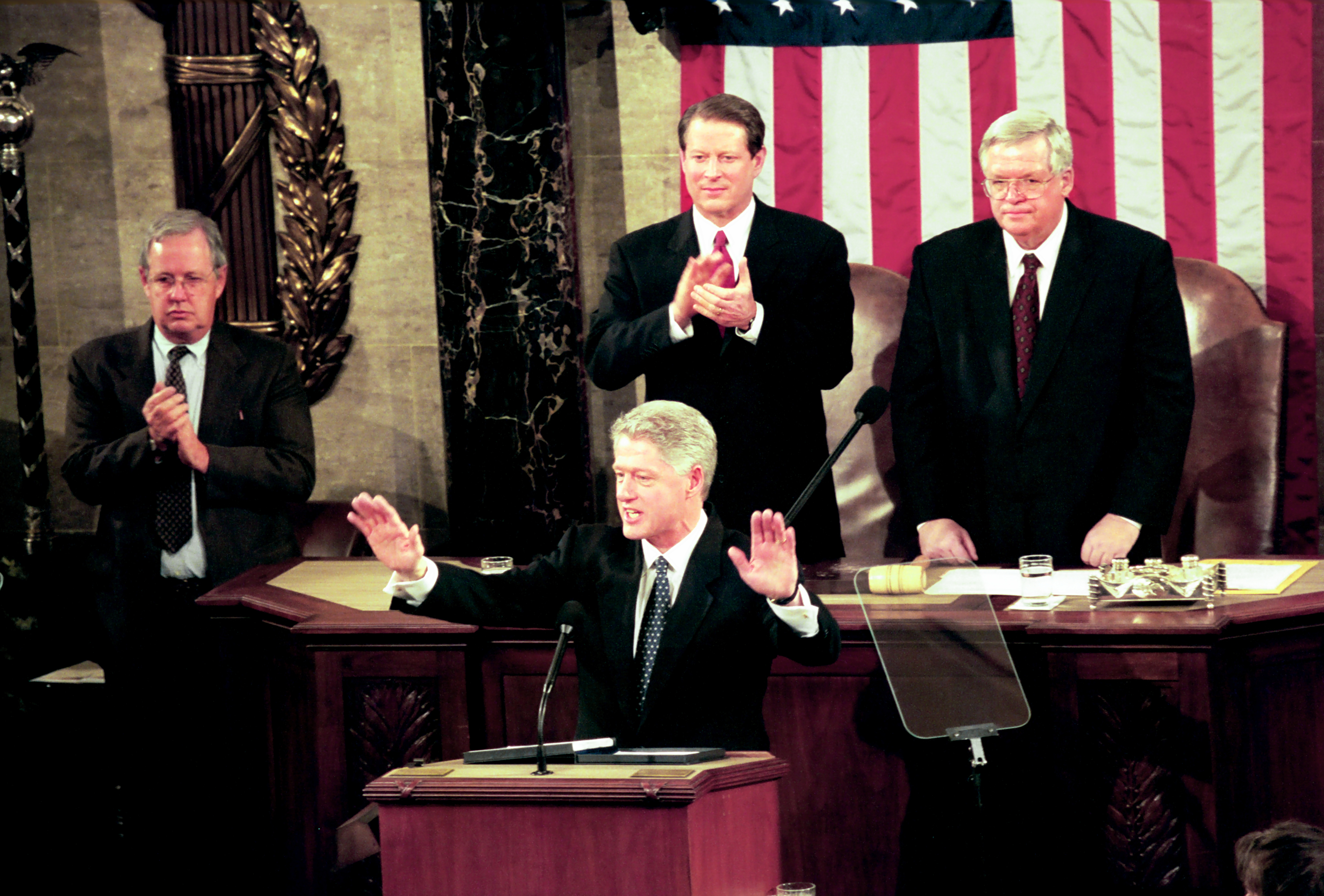 President Bill Clinton's State of the Union Speech before a joint session of Congress, Washington DC, January 19, 1999. Behind him is Vice President Al Gore and House Speaker Dennis Hastert. (Photo by David Hume Kennerly/Getty Images)