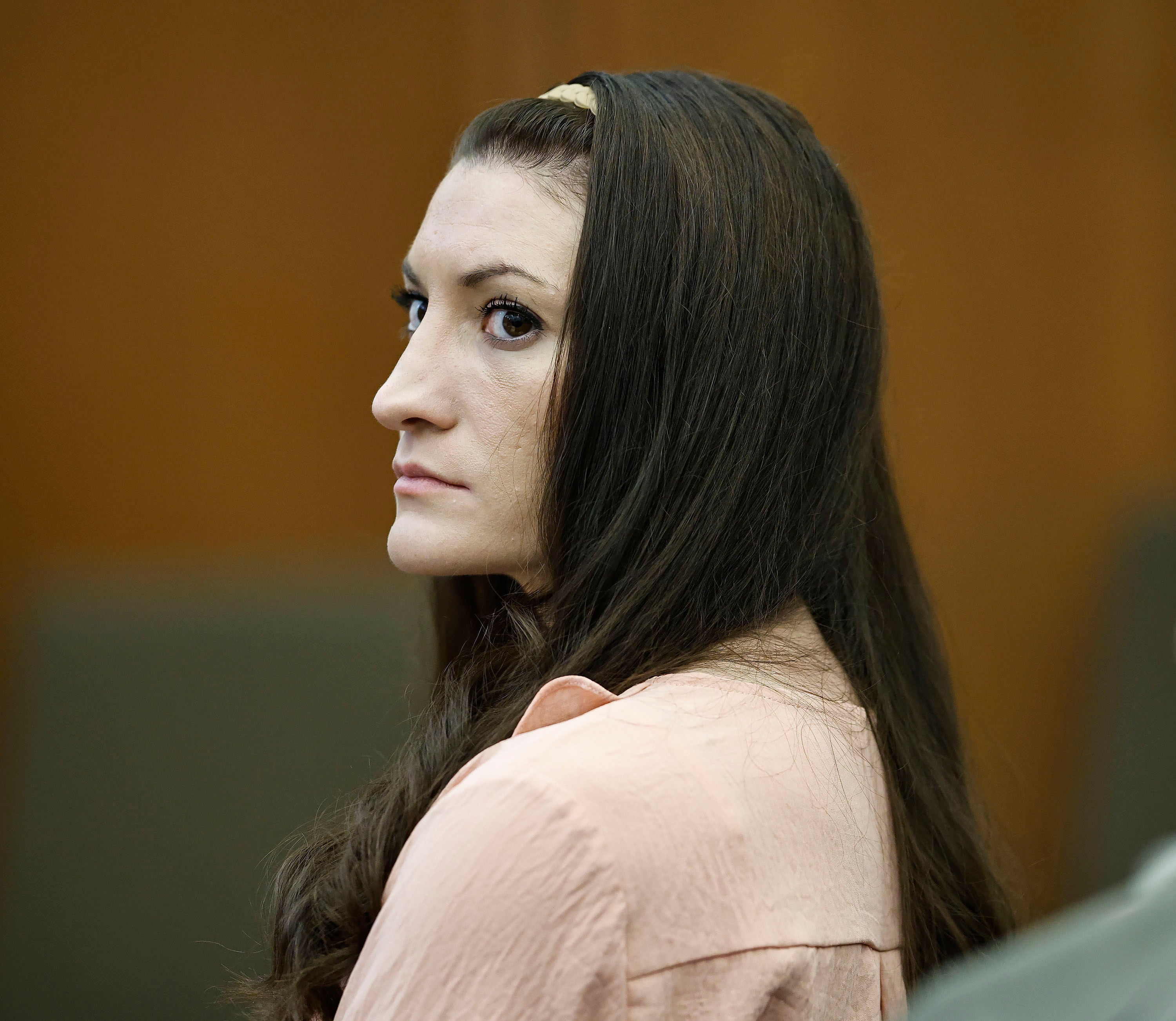 Defendant Lindsay Clancy watches the jury as Judge William Sullivan addresses them at the start of the day in court during the Lindsay Clancy murder trial in Plymouth Superior Court, Plymouth, Mass., on Tuesday, Aug. 25, 2026. (Greg Derr/The Patriot Ledger via AP, Pool)