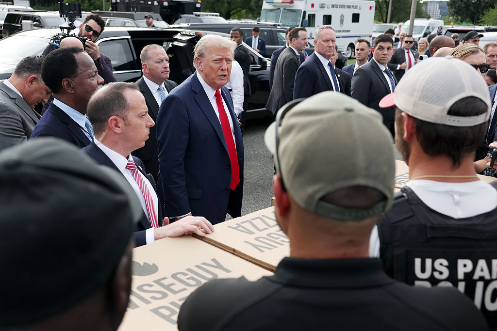 WASHINGTON, DC - AUGUST 21: U.S. President Donald Trump visits with law enforcement officers at the U.S. Park Police Anacostia Operations Facility on August 21, 2025 in Washington, DC. The Trump administration has deployed federal officers and the National Guard to the District in order to place the DC Metropolitan Police Department under federal control and assist in crime prevention in the nation's capital. (Photo by Anna Moneymaker/Getty Images)