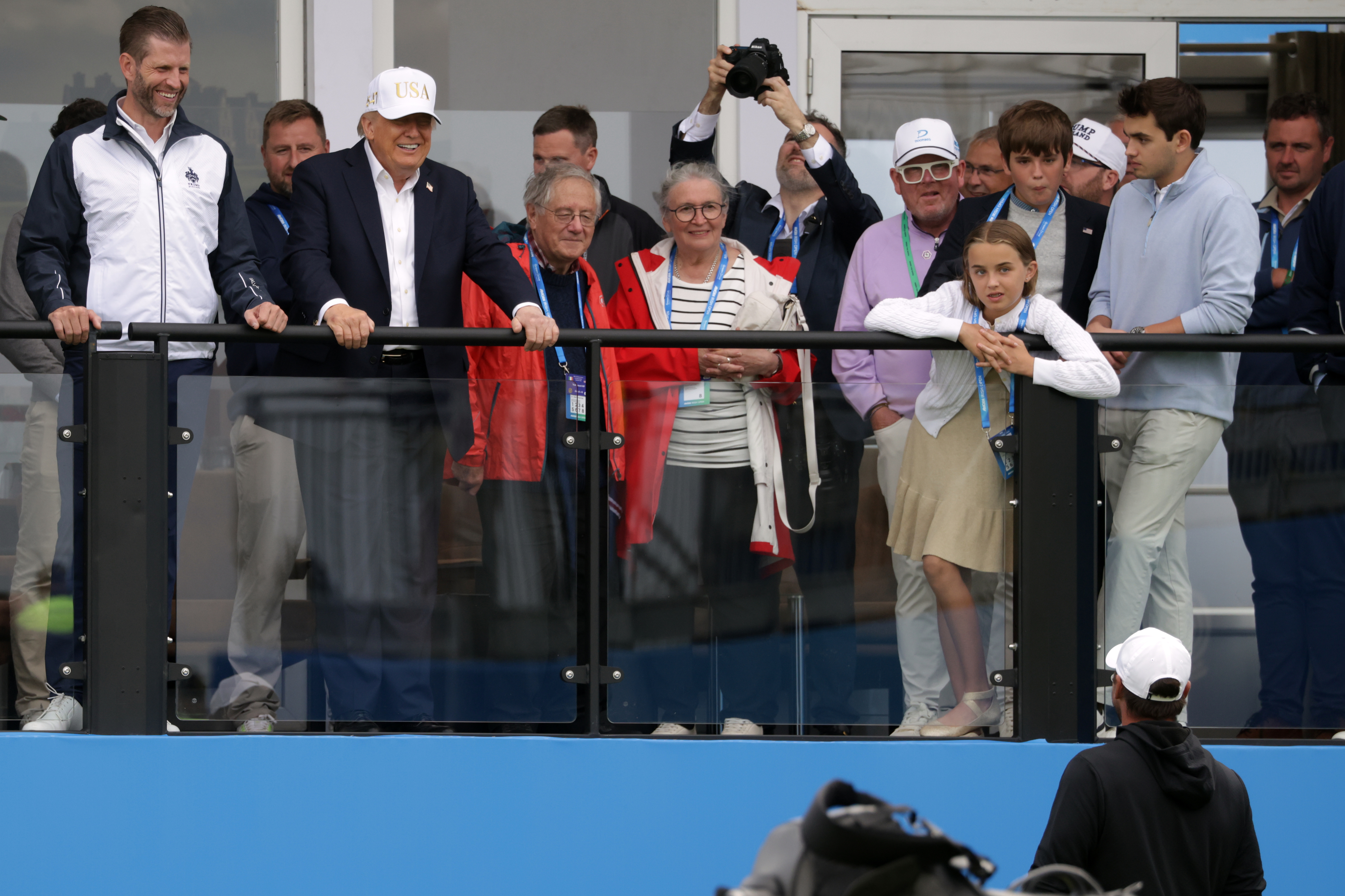 U.S. President Donald Trump chats with US golfer Brooks Koepka at the Irish Open at the Trump International Golf Links course in Doonbeg, Ireland, Saturday, Sept. 12, 2026.(AP Photo/Peter Morrison)