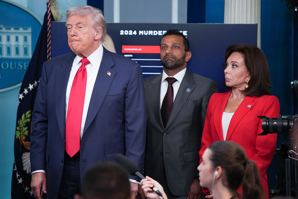 WASHINGTON, DC - AUGUST 11: U.S. President Donald Trump attends a press conference with FBI Director Kash Patel (C) and U.S. Attorney for the District of Columbia Jeanine Pirro (R) in the James S. Brady Press Briefing Room of the White House August 11, 2025 in Washington, DC. Trump announced he will use his authority to place the DC Metropolitan Police Department under federal control to assist in crime prevention in the nation’s capital.  (Photo by Andrew Harnik/Getty Images)